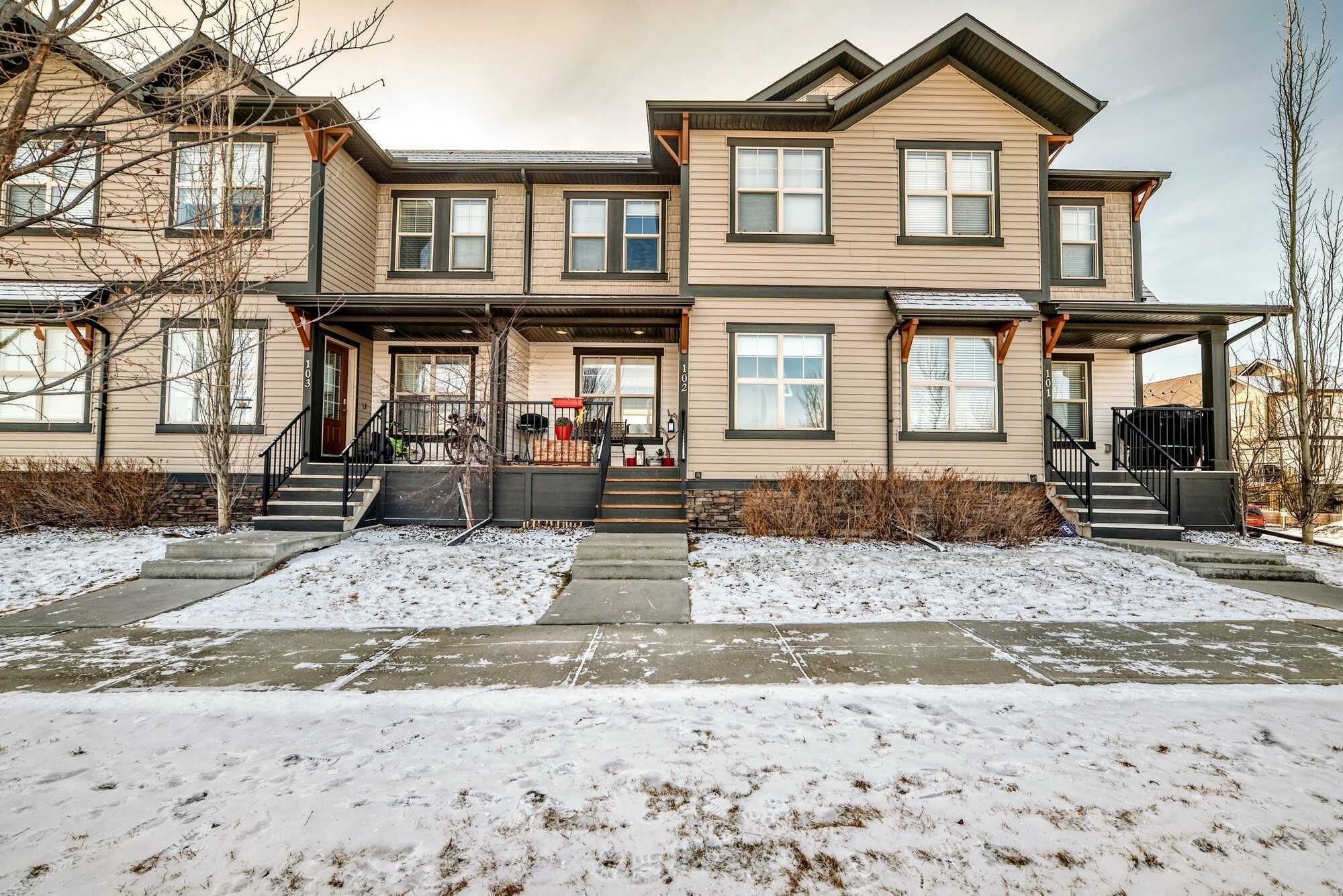Impeccably maintained park front townhouse with double garage. 2