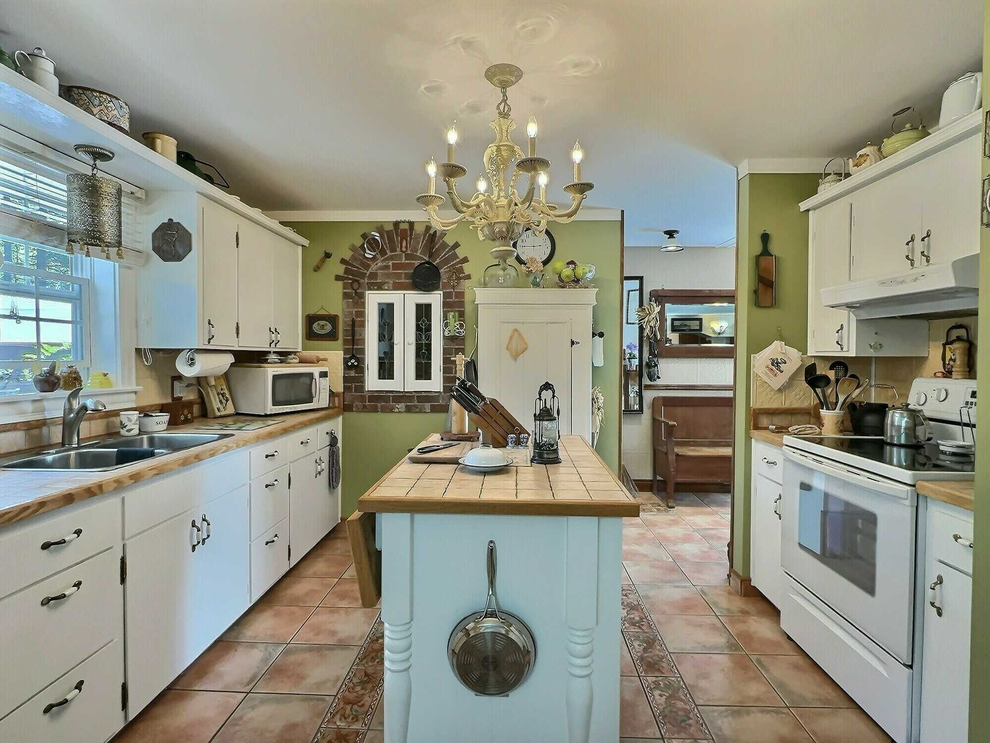 An entertainers dream! Welcome to this beautifully maintained 2,500 square foot home, offering a perfect blend of style and functionality. 3