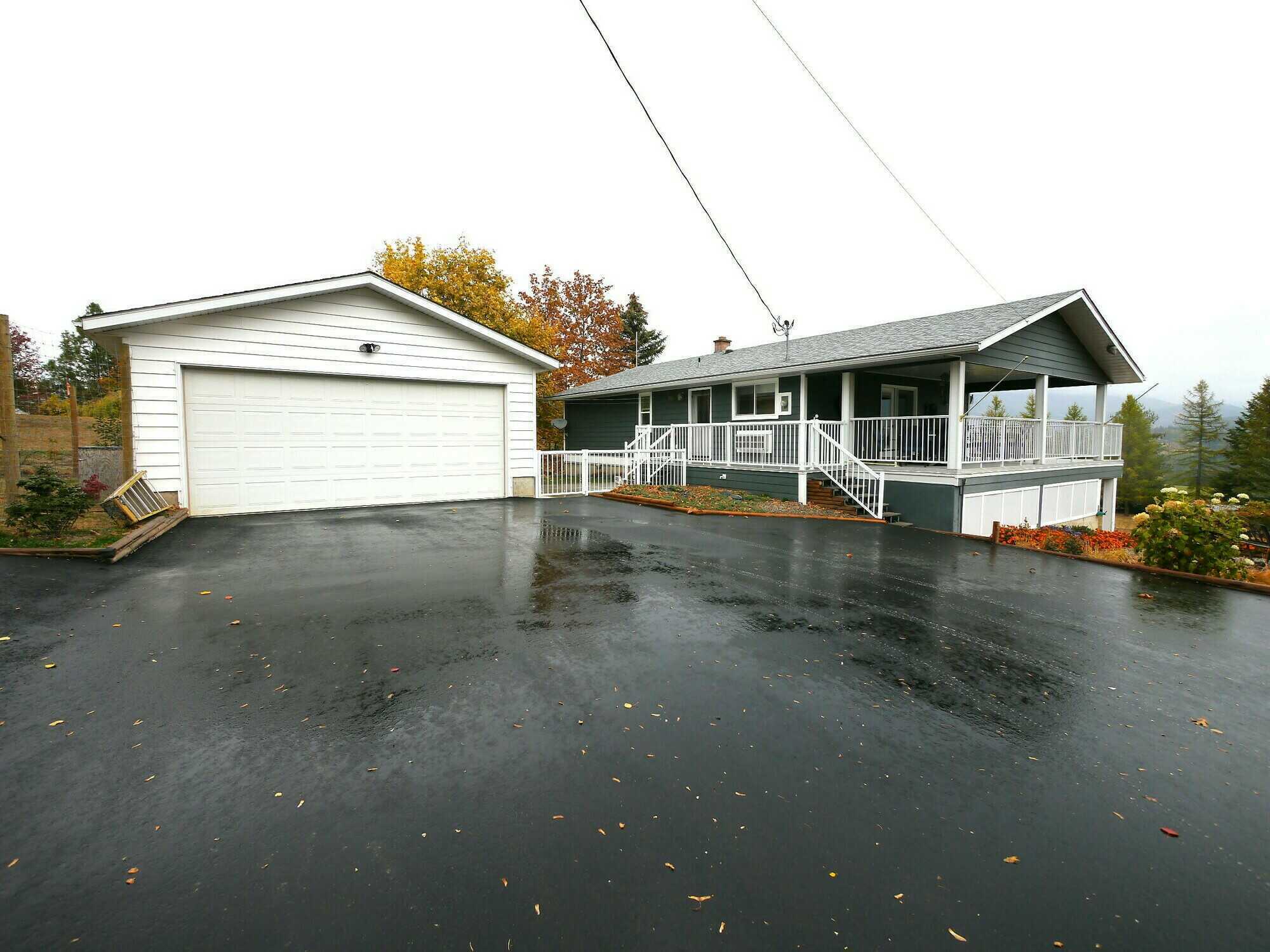 Boasting breathtaking views, this immaculate move in ready 3 bed 2 bath home will impress even the most discerning buyer. Hardwood flooring, tastefully finished and decorated on 1.77 acres with double detached garage, carport and more! 5
