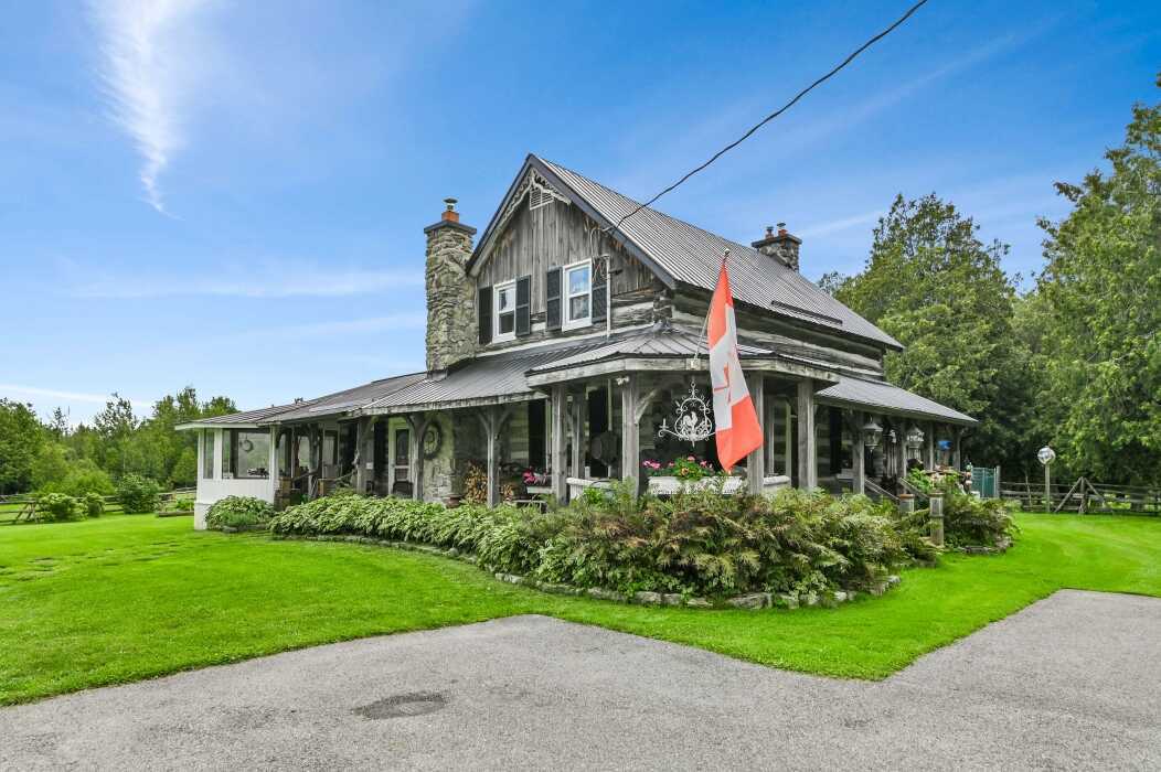 Rare 28-Acre Restored Heritage Log Farm with Seven Outbuildings, Pool and Commercial Zoning—20 Minutes West of Kanata 2
