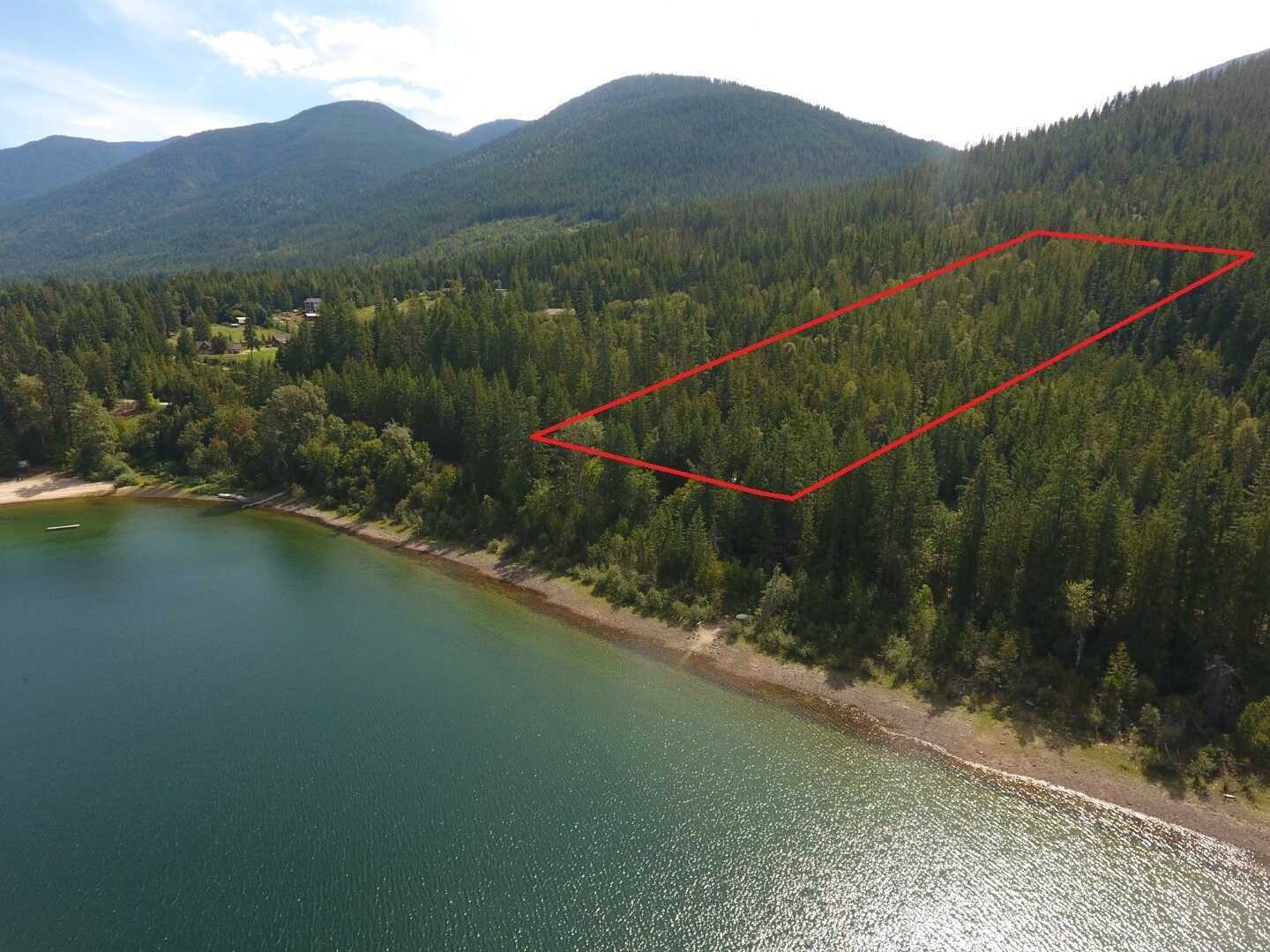 Lakeside! Sub dividable! Over 11 Acres! Borders Crown Land! Great location with ample privacy! 5