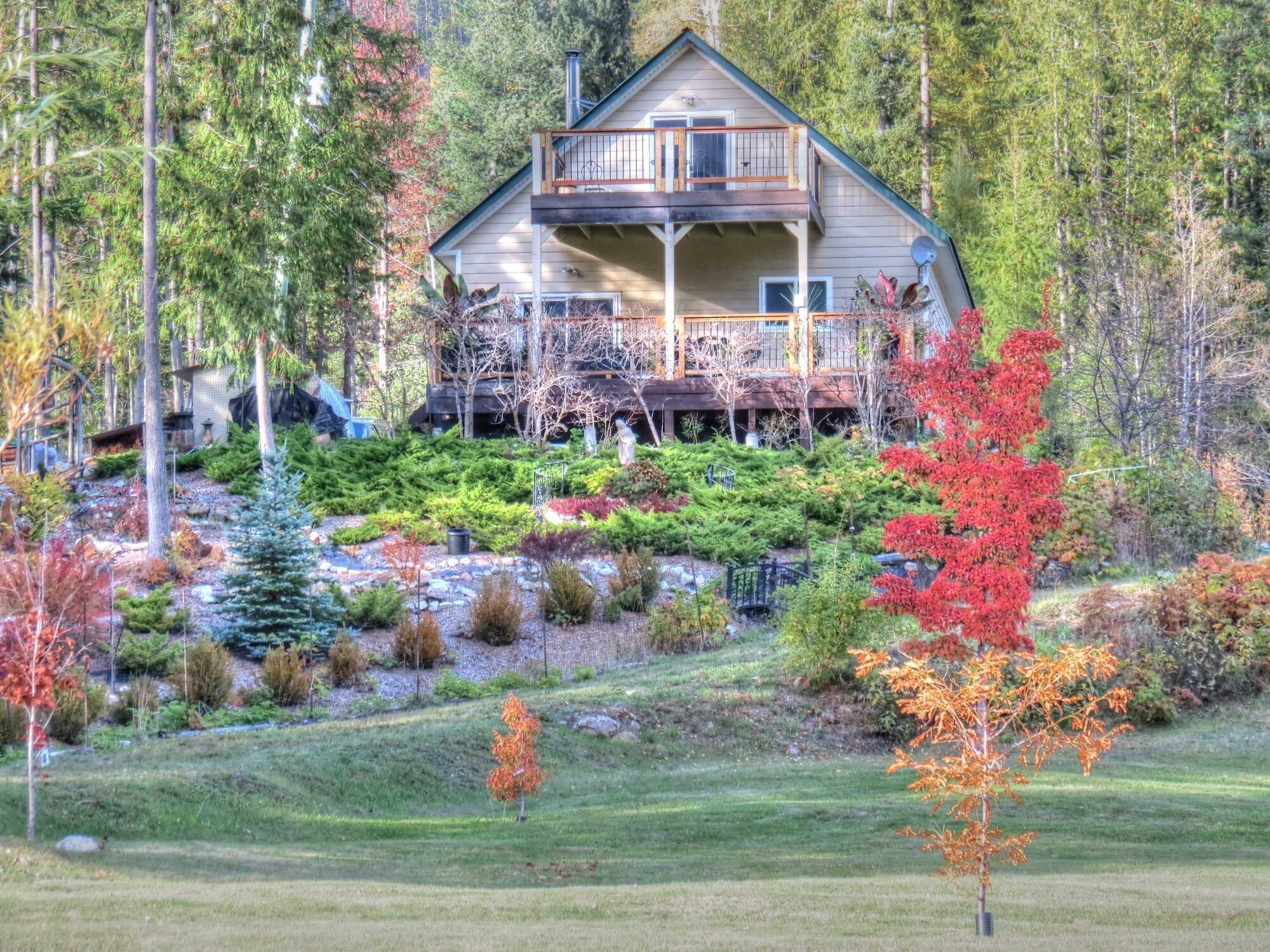 SPECTACULAR LAKE & MOUNTAIN VIEWS AT THE DOOR STEP! 3Bed 1.5Bath Lakehouse! 300ft of Waterfront! Beautiful Deck! Balcony! Over 3Acres of absolute privacy & beautifully landscaped! Private beach! Boat Launch access 2
