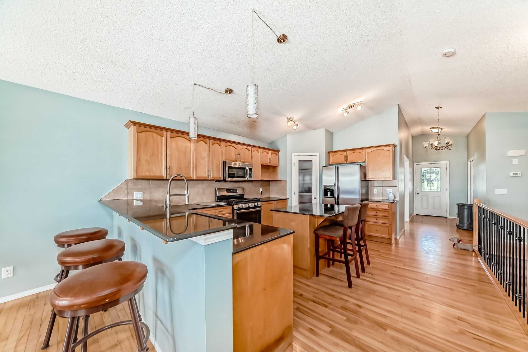 Walkout Bungalow with separate suite! On the Speargrass Golf Course! 4