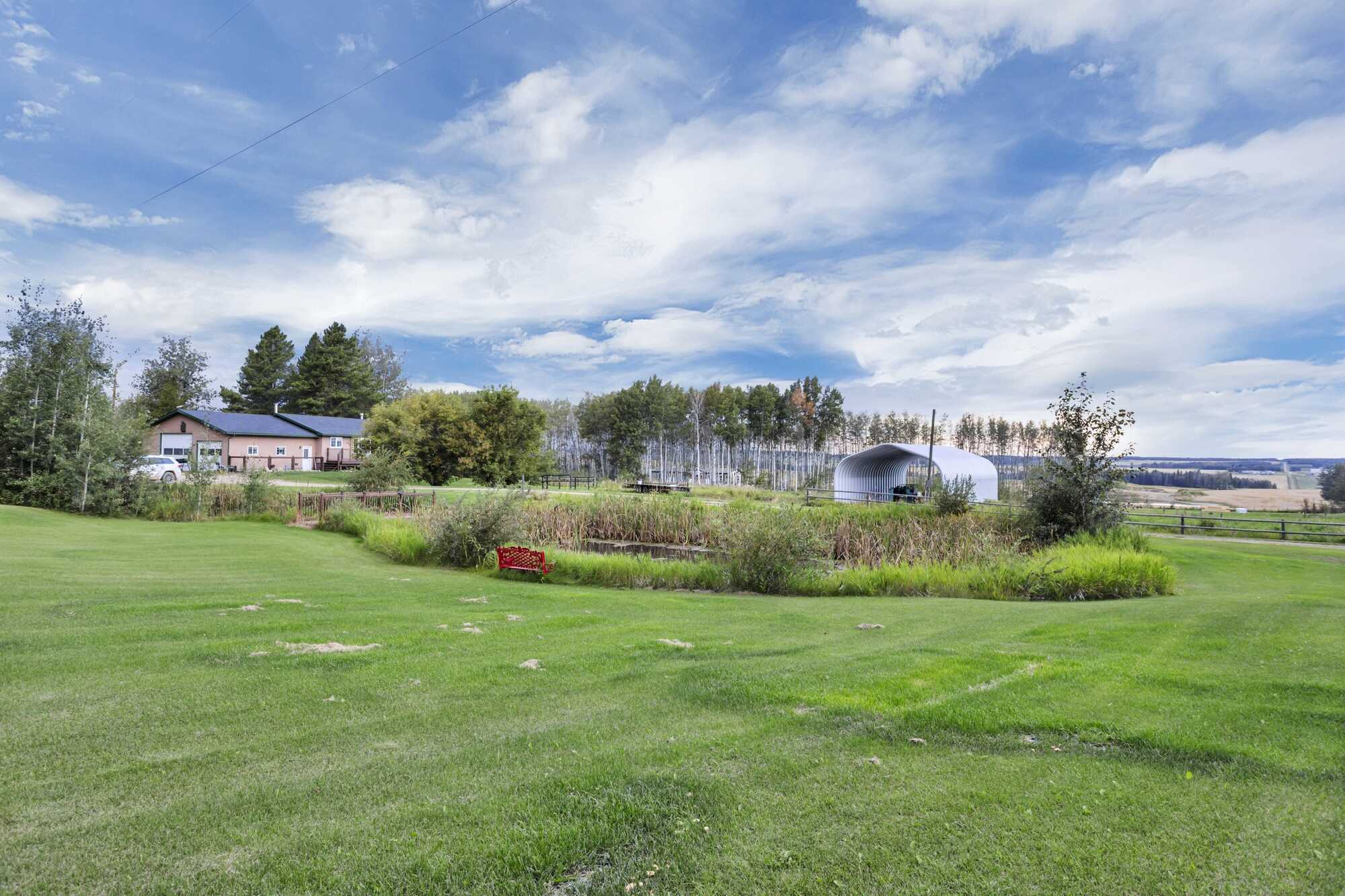 5.98 Acres ~ 5 Bed Bungalow With A/C ~ Oversized Triple Garage ~ 18'x55' Quonset 5