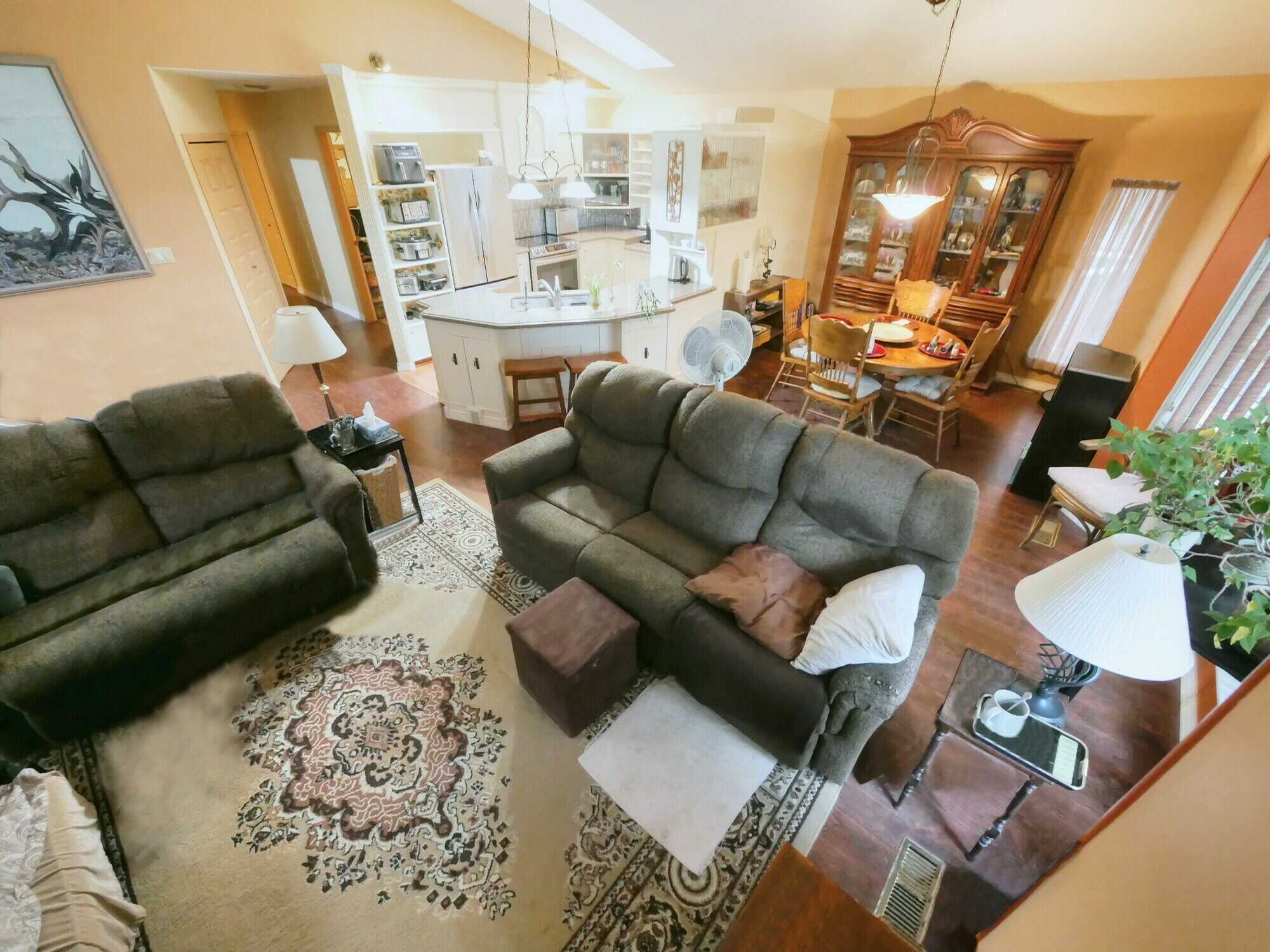 CALL DIRECTLY for INQUIRIES  250-693-2328   *UNIQUE CUSTOM built multi level FAMILY Home & Shop on nearly 2 acres of landscaped paradise! Extremely private!  Located in Genelle! No Backyard Neighbours! 5