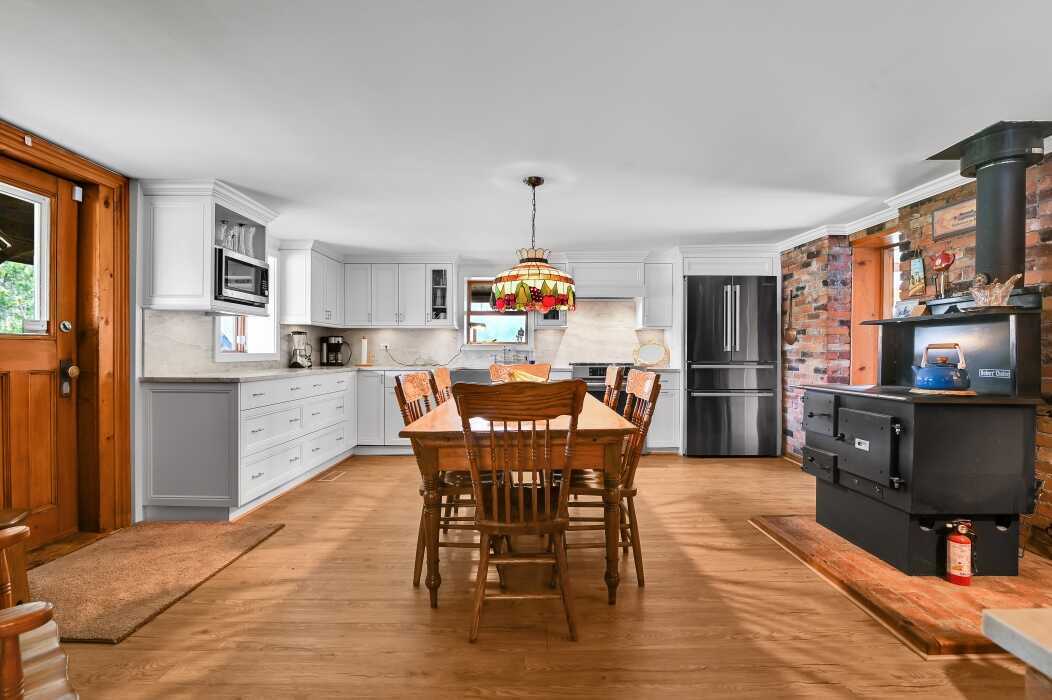 Rare 28-Acre Restored Heritage Log Farm with Seven Outbuildings, Pool and Commercial Zoning—20 Minutes West of Kanata 4