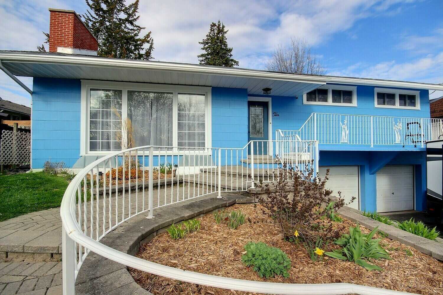 Bright 3 Bedroom 3 Level Split with Double Garage, Large Yard and Prime In Town Location 2