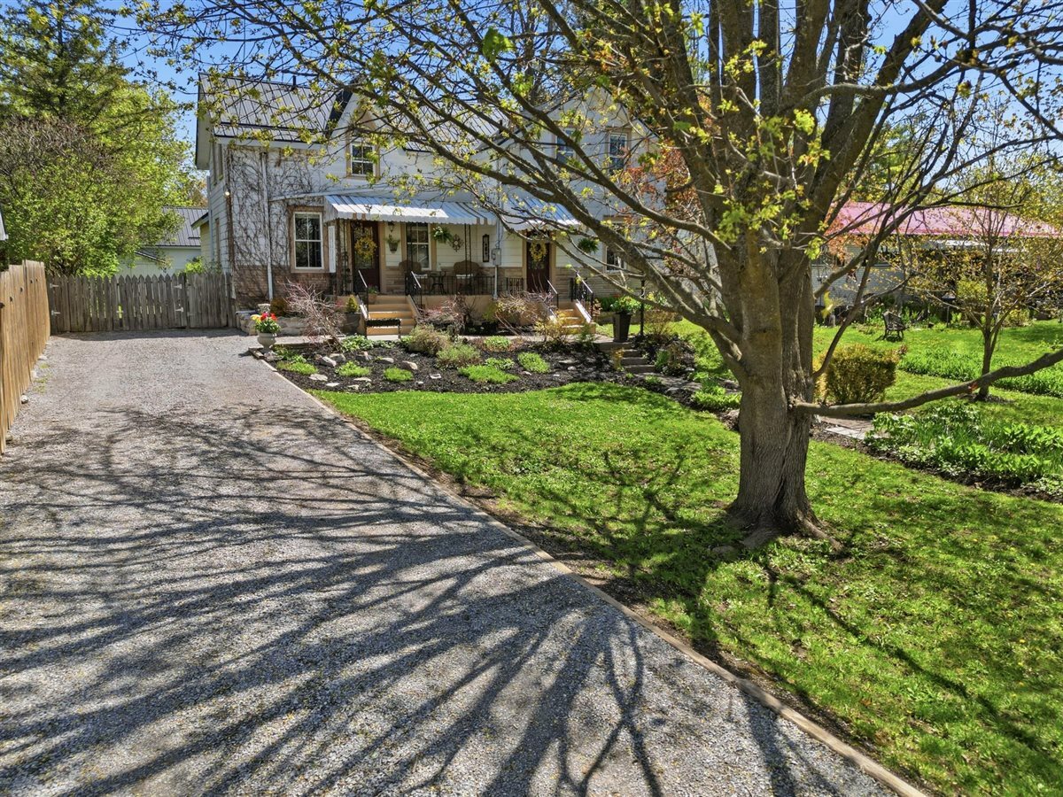 Historical 1891 Home with Carriage House, Workshop & Timeless Character 3