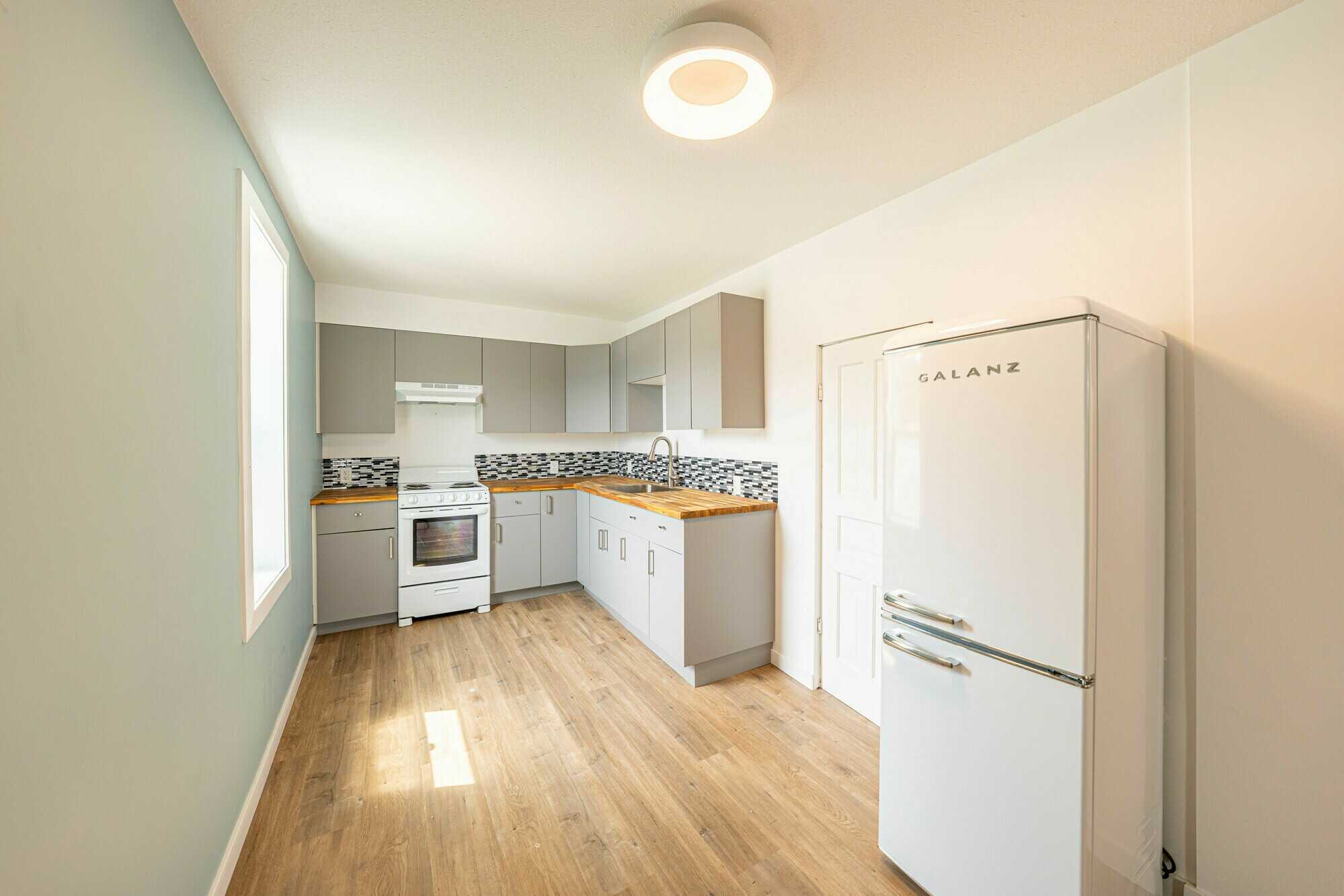 Incredible investment opportunity! Renovated 5 plex in central location, walking distance to town, with outstanding income. 4