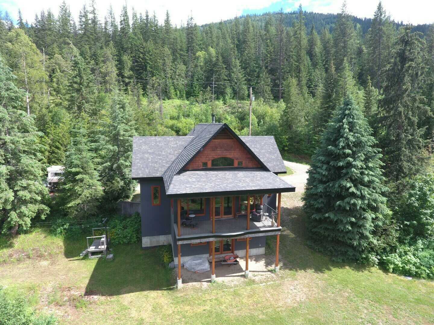 PRIVATE EXECUTIVE 4Bed 3Bath Home on 2+ Acres next to Beaver Creek, with water rights!  NEW high end appliances! NEW Septic! Amazing kitchen with commercial gas stove! Custom built windows, 23, all opening. 2