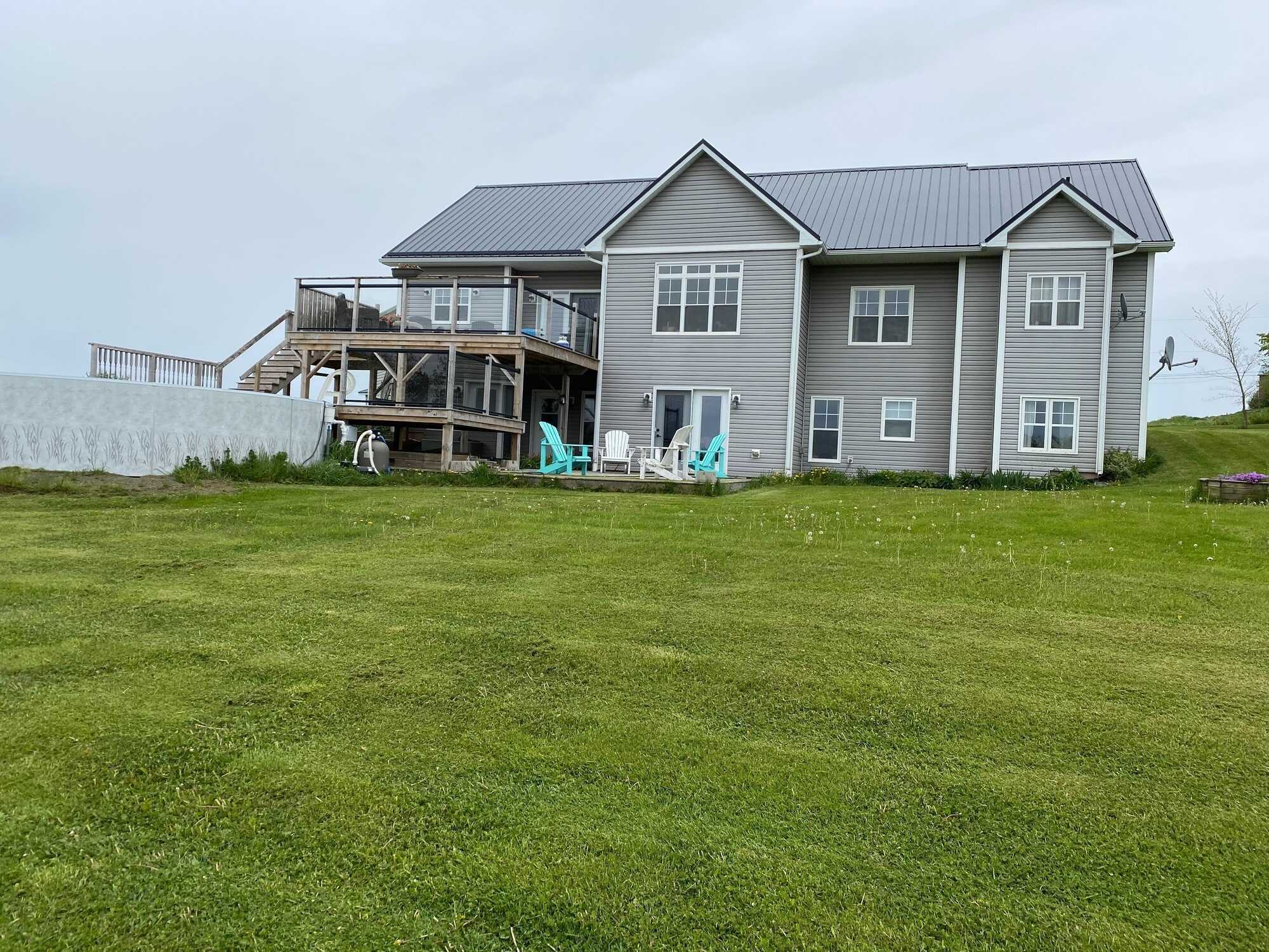 Custom-built 5-bedroom riverfront home on 34 acres with barn, pool, mixed-use zoning, and breathtaking views of the Musquodoboit River. Less than an hour from Halifax, yet a world away from the hustle and bustle. 4