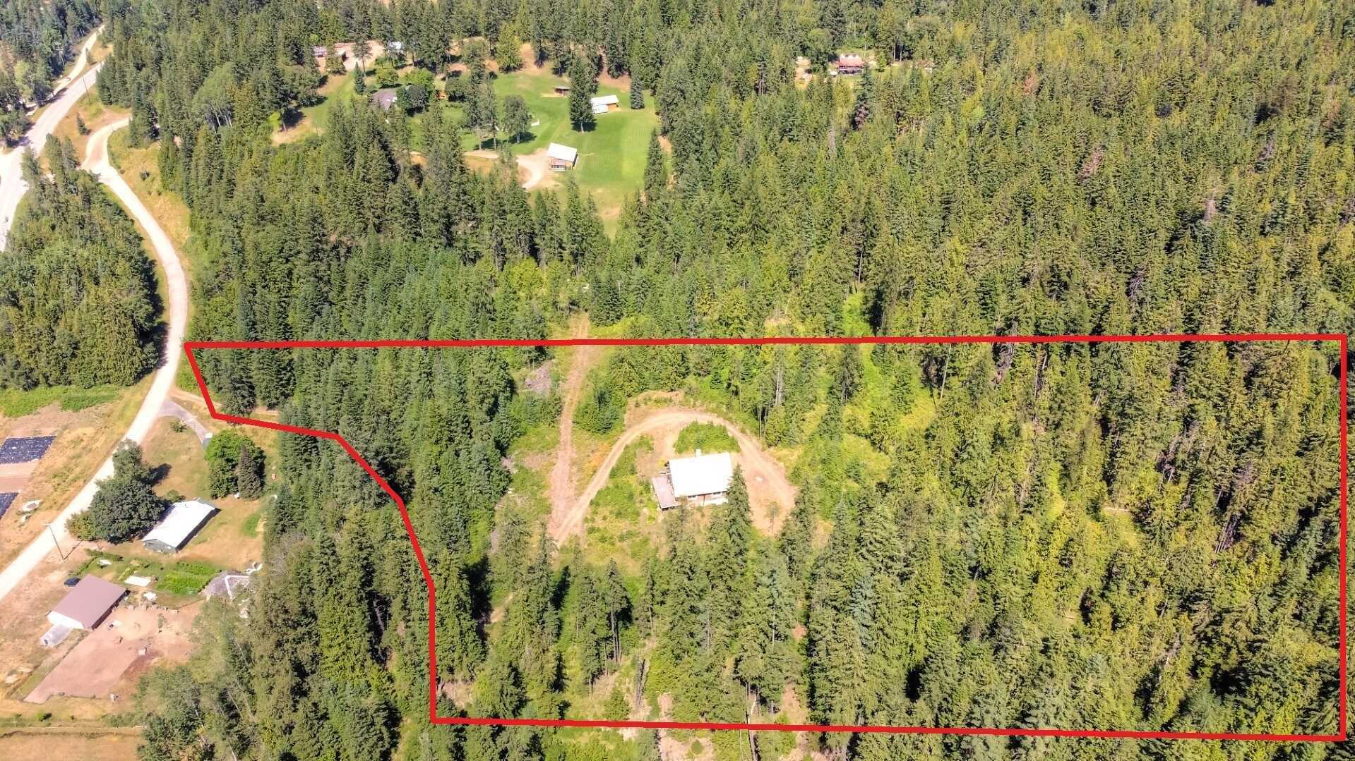 READY & WAITING to be finished 2-3 Bed Country Cottage with views of the Slocan River on 8 ACRES of pure heaven!  Beneath the Slocan Valley skies, this home is paradise! 2