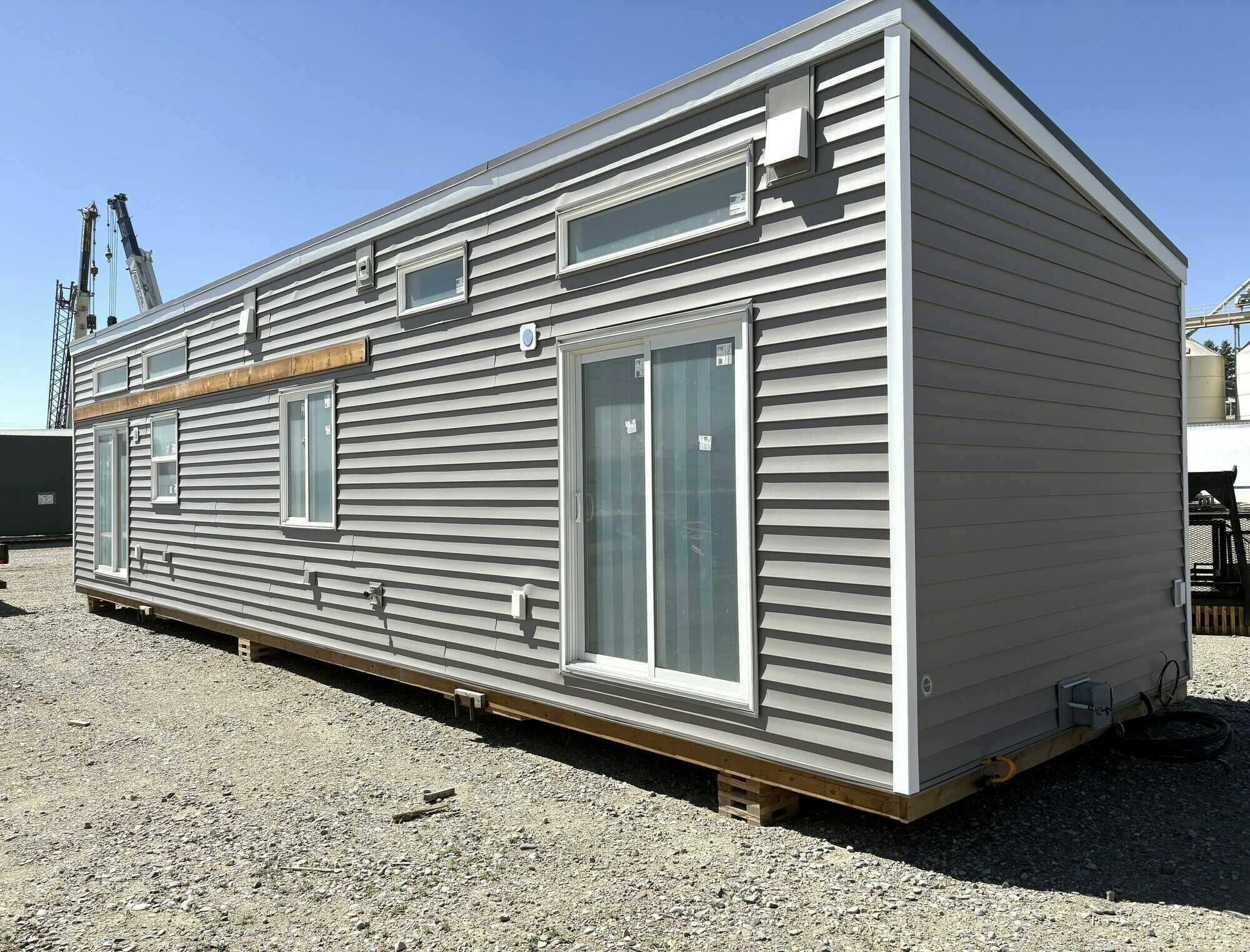 Brand New Modular Home –
(Foundation-style Tiny House) Never Lived In. Ground floor level bedrooms. 3