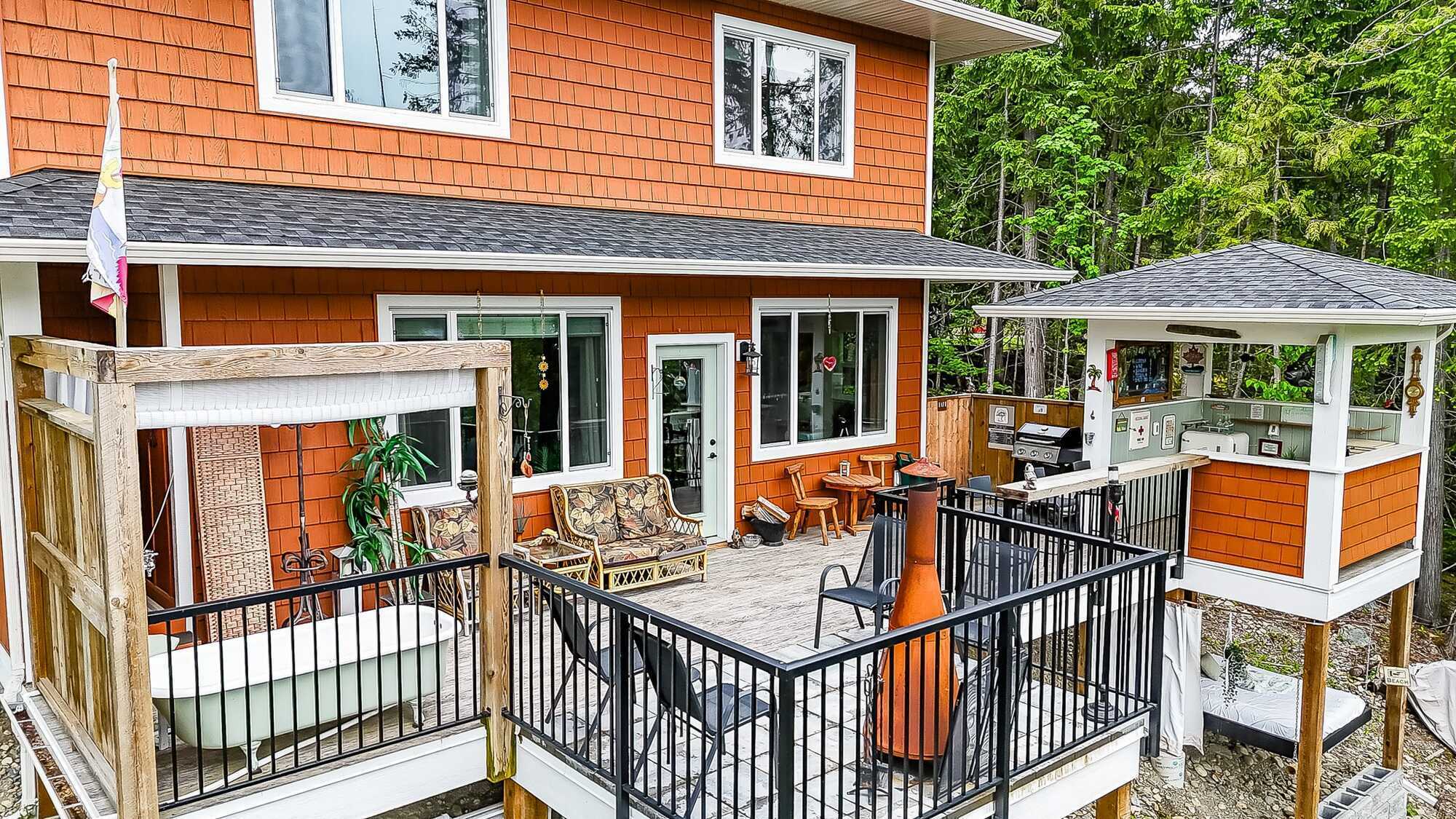 Built in 2022 and covered by a new home warranty, this custom 3 bedroom, 3 bathroom cottage blends modern comfort with relaxed lake living with potential for 4 season living! 2