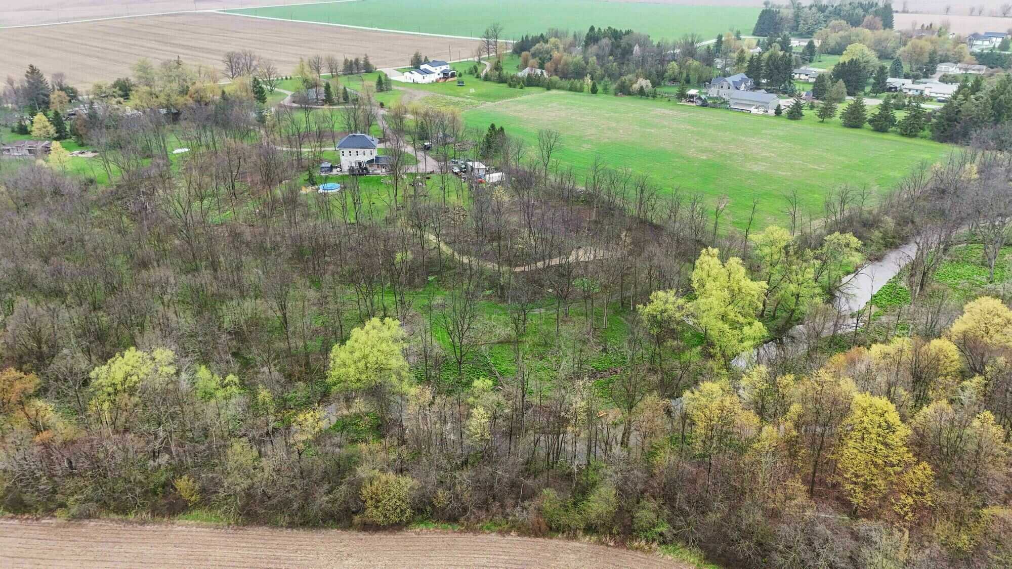 20.5-Acre Private Country Estate with Custom Luxury Home, Guest House & Endless Potential in North Middlesex - Close to London, Grand Bend and Strathroy. 4