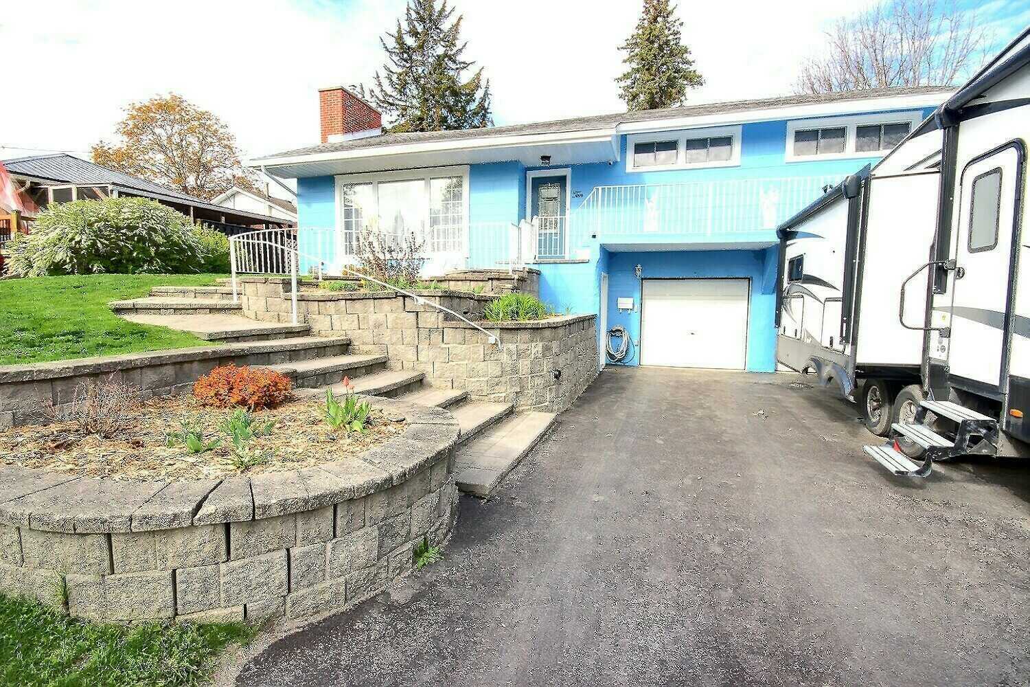 Bright 3 Bedroom 3 Level Split with Double Garage, Large Yard and Prime In Town Location 4