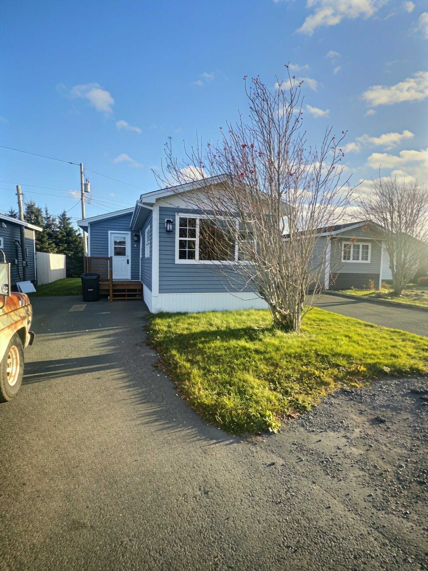 Fully Renovated Two-Bedroom Home with New Roof, Siding & Decks — $240,000 1