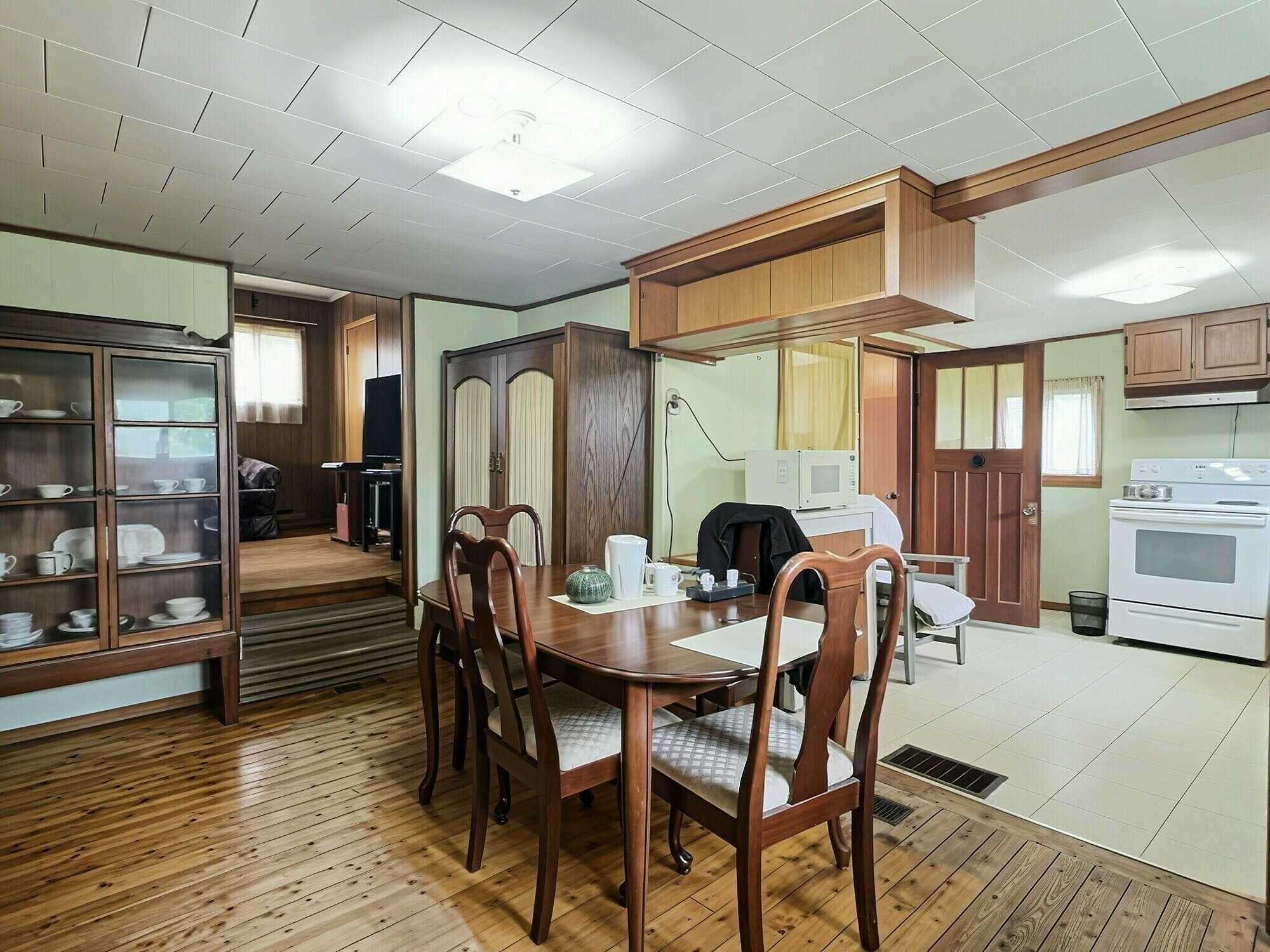 Bring your vision and restore the charm of this century home set on 11 beautiful acres of peaceful countryside! 5