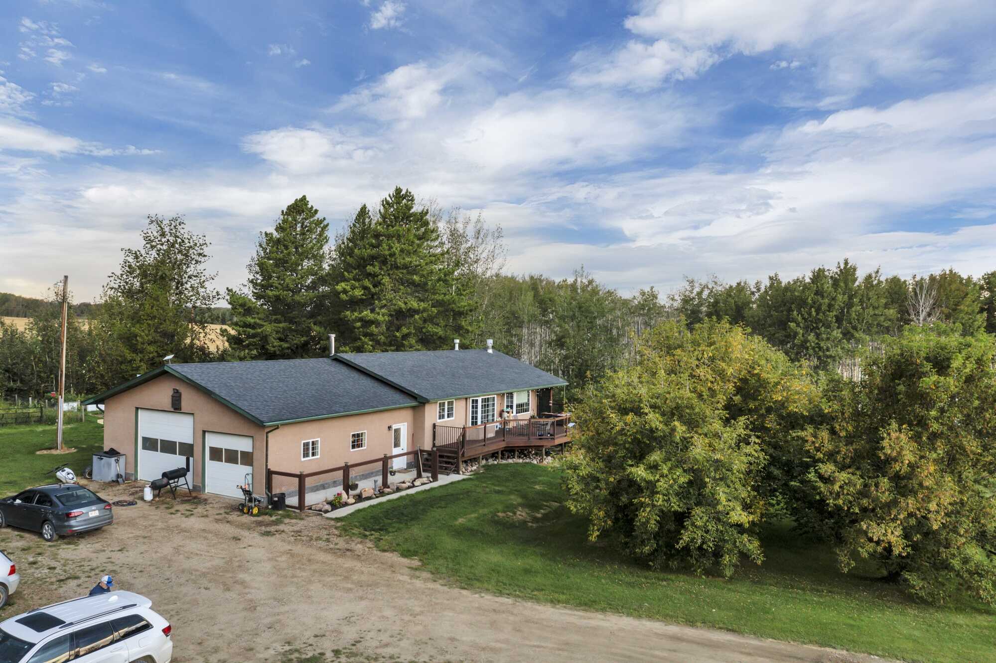 5.98 Acres ~ 5 Bed Bungalow With A/C ~ Oversized Triple Garage ~ 18'x55' Quonset 3