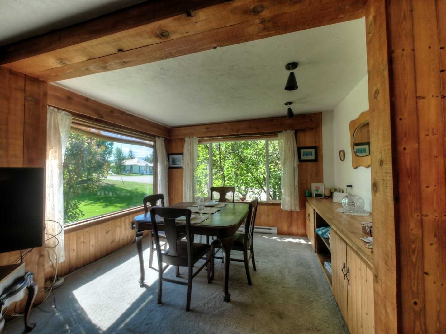 MOTIVATED SELLERS!!!  READY TO DOWNSIZE!!!  Own the whole block!! Private 1/4 acre lot with Valhalla Mountain views throughout!! 2 Bay detached carport with workshop with ample storage and detached greenhouse. 4