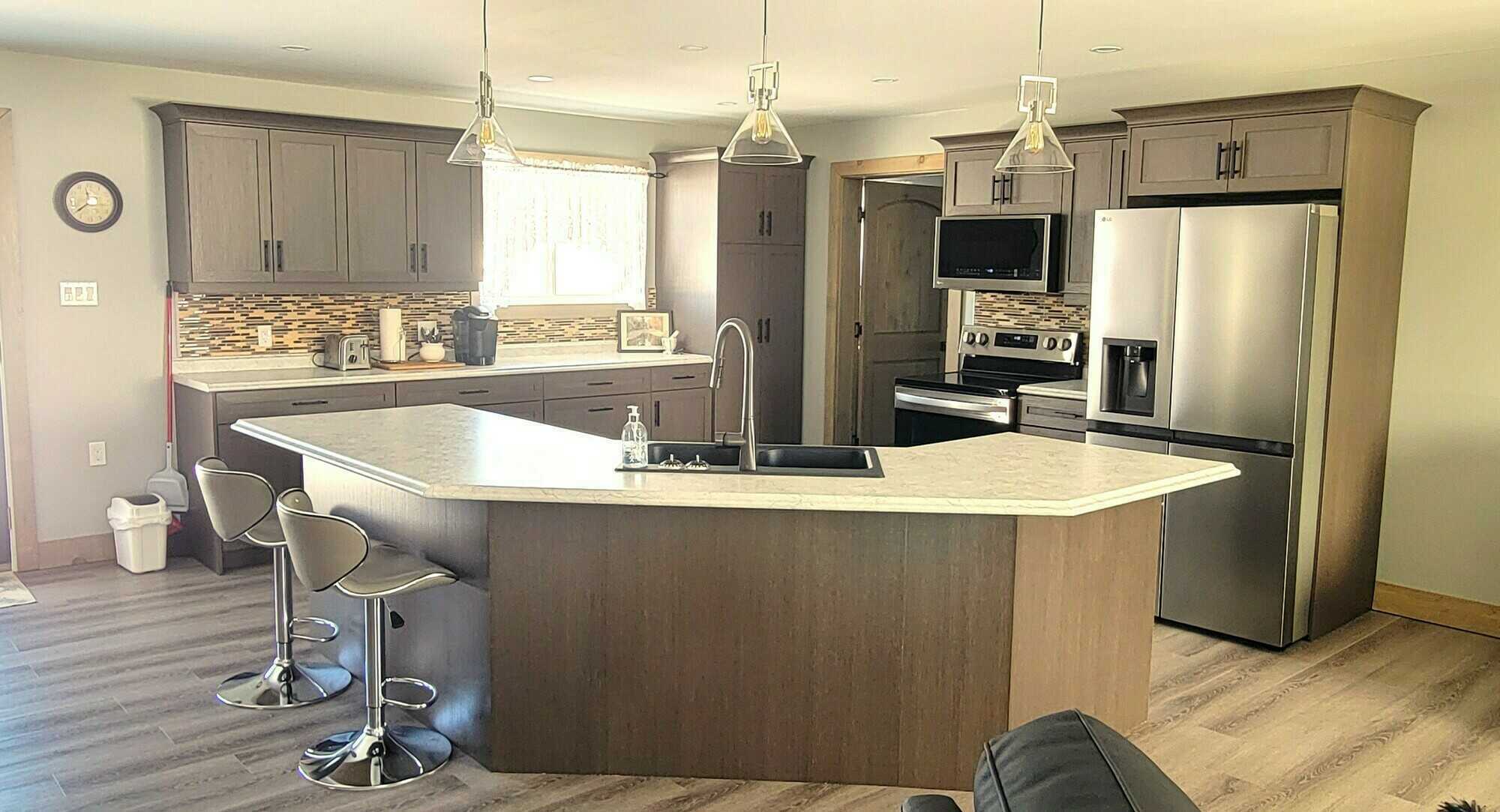 Open House Saturday May 30th 1PM - 4PM. Stunning custom-built home. The spacious layout includes a large garage and in-law suite. Step out from the private deck off the primary bedroom. This home is an exceptional opportunity you won’t want to miss. 5