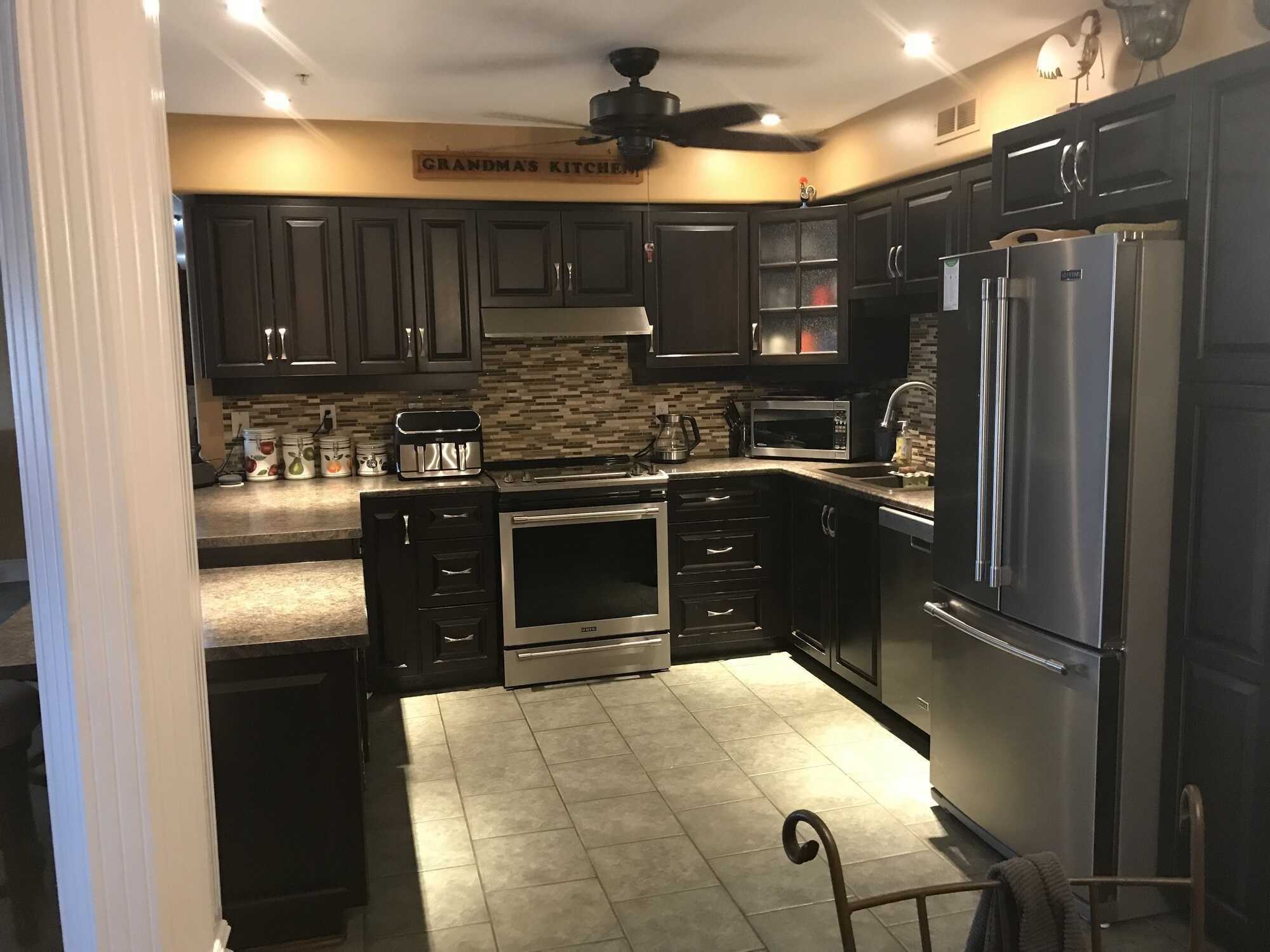 Beautifully Adapted 3-Bedroom + Den Condo 4