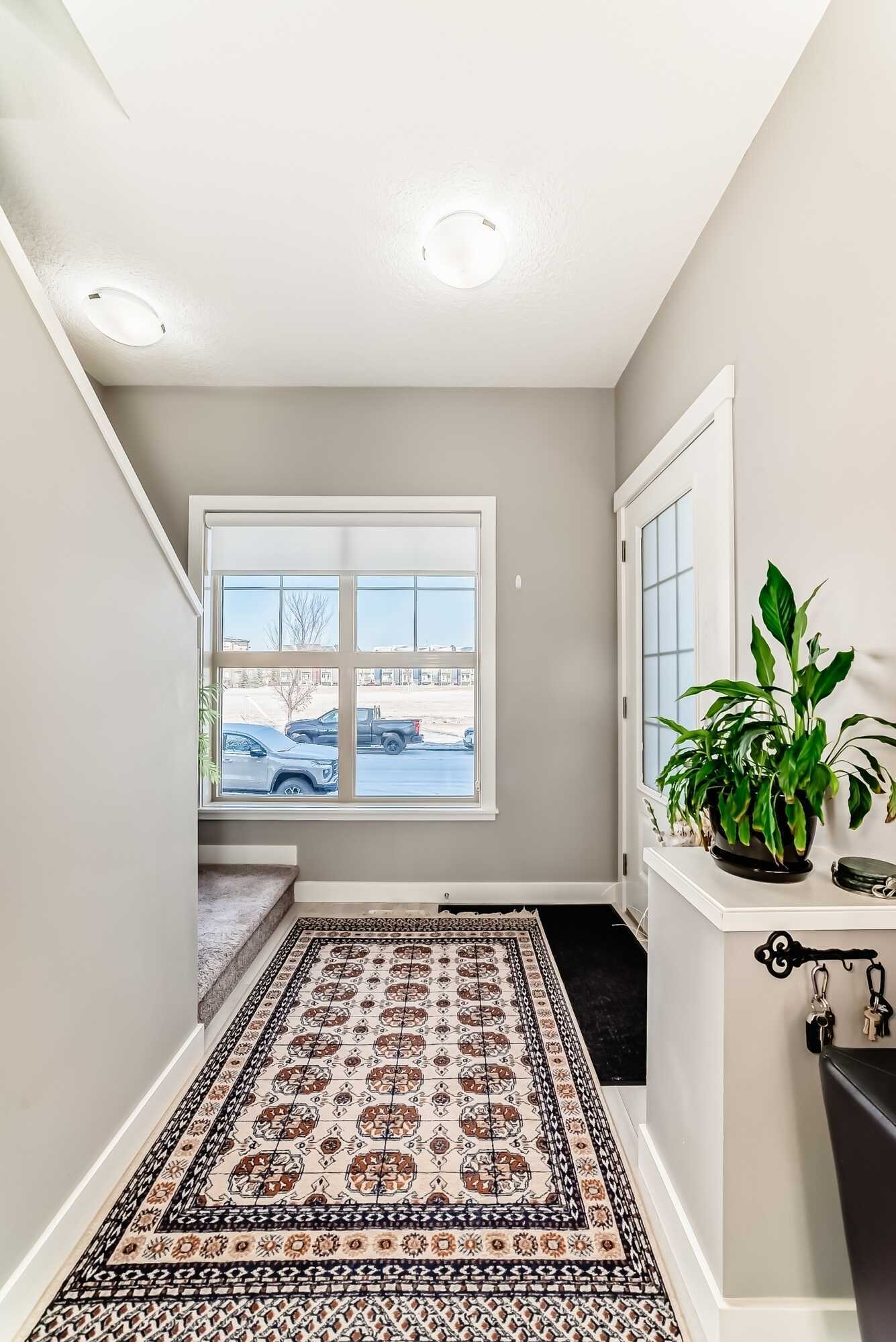 Impeccably maintained park front townhouse with double garage. 5