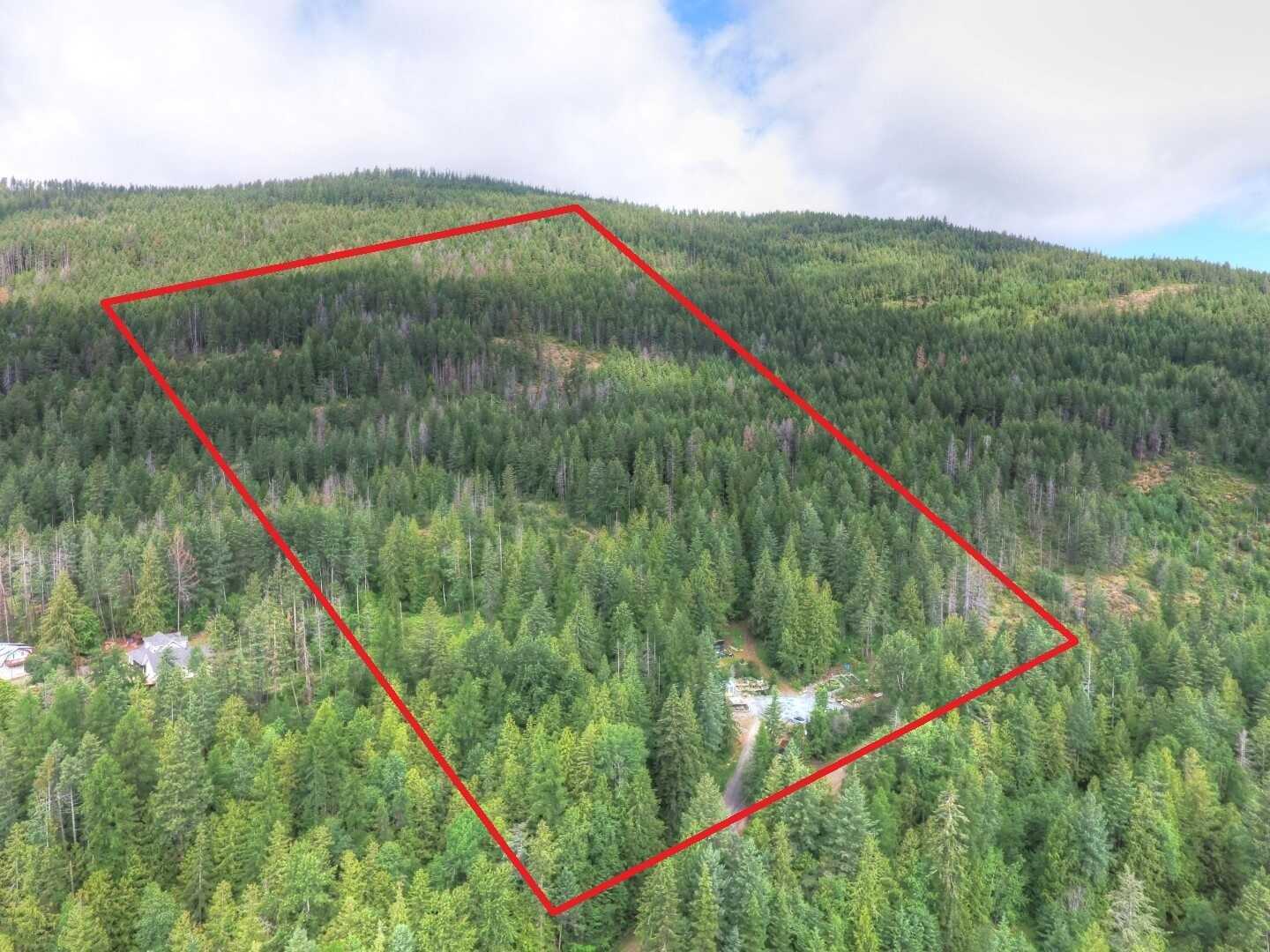DIRECT CONTACT @  250-977-5898  * OFFERING $12,000 COMMISSION!!!!  Amazing Acreage! Nearly 10 Acres – Benched w/ Timber! 2Bed 1Bath Mobile home w/ Addition & 2 Level Deck! Landscaped! Opportunity to build your DREAM VIEW HOME! 3