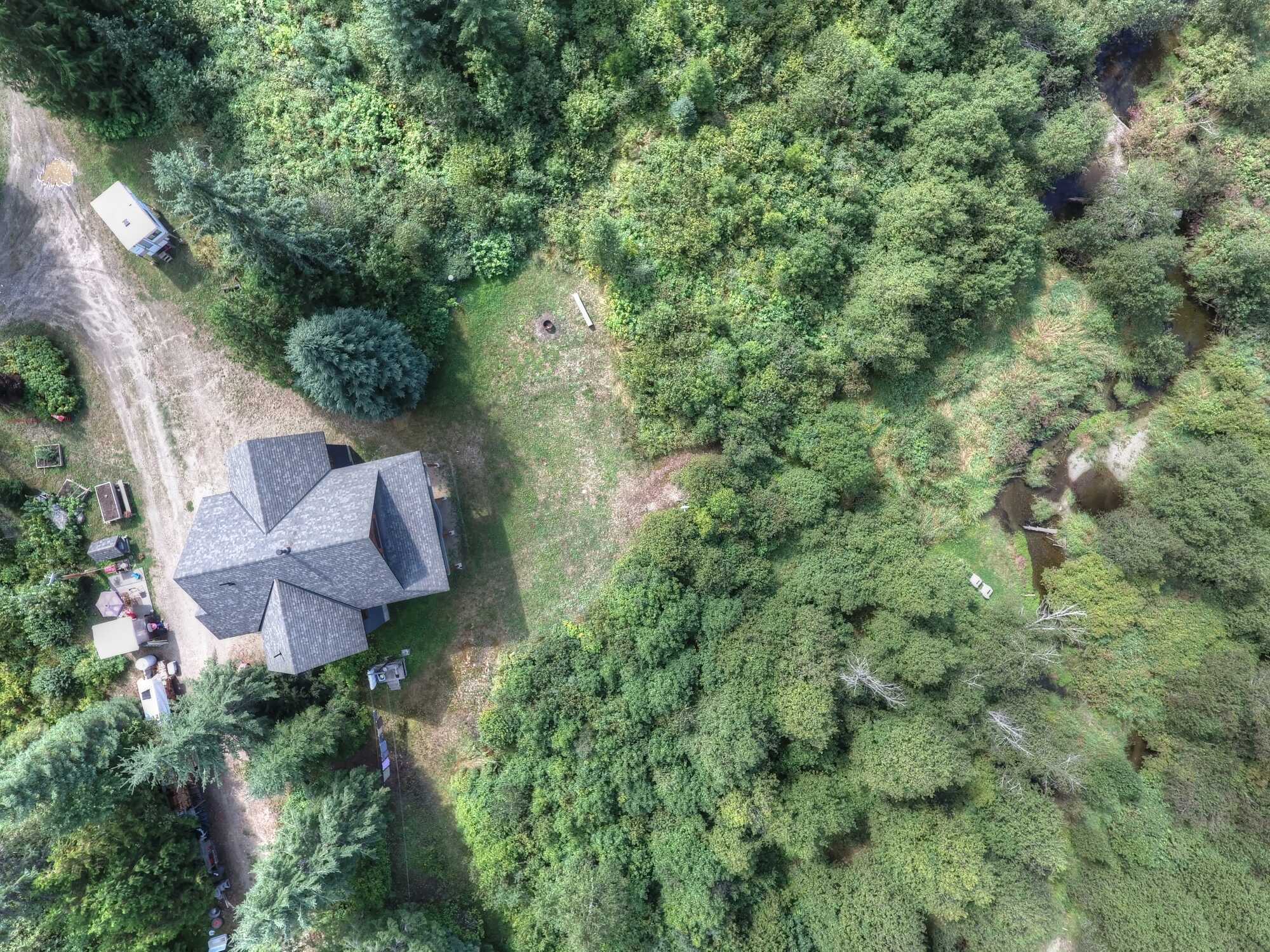 PRIVATE EXECUTIVE 4Bed 3Bath Home on 2+ Acres next to Beaver Creek, with water rights!  NEW high end appliances! NEW Septic! Amazing kitchen with commercial gas stove! Custom built windows, 23, all opening. 4