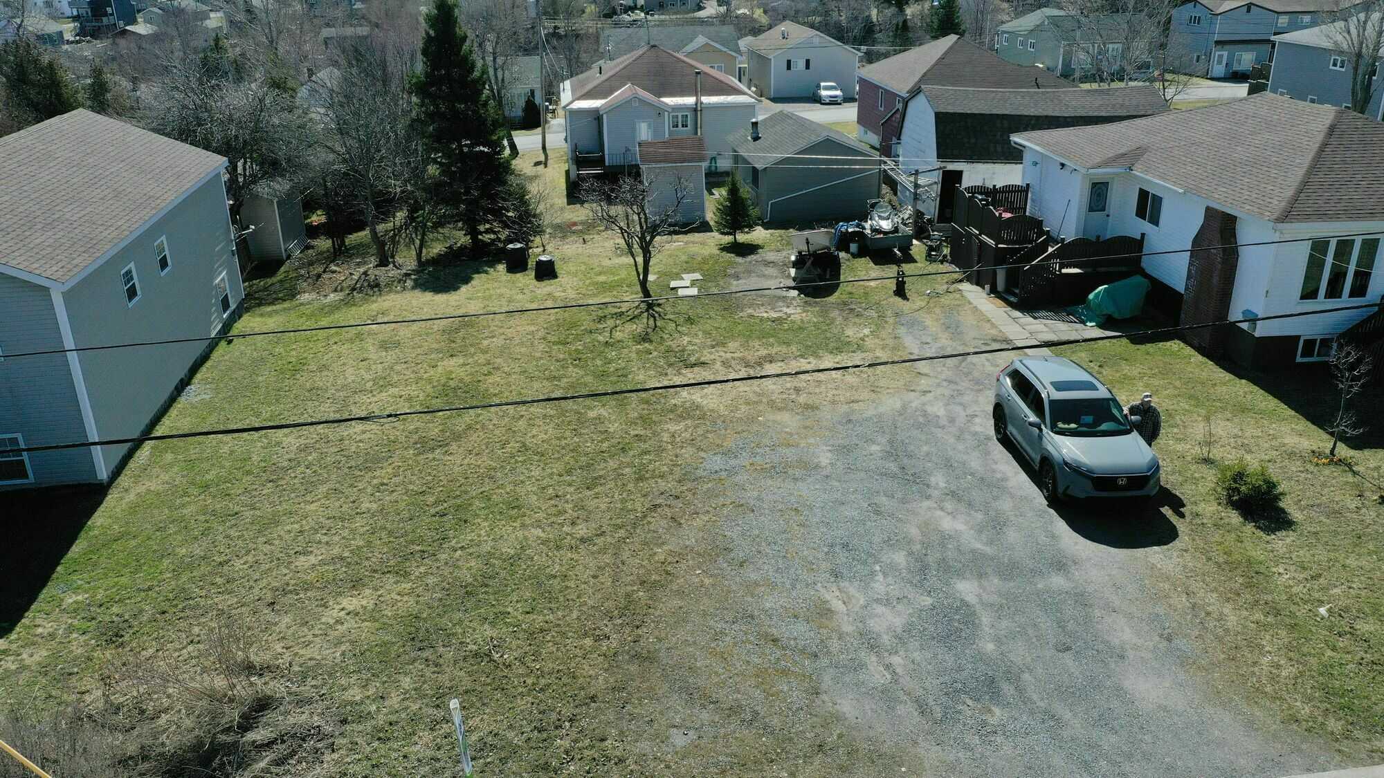 For sale: Prime vacant land, measuring 50 feet by 100 feet, offering a blank canvas for your dream project 4