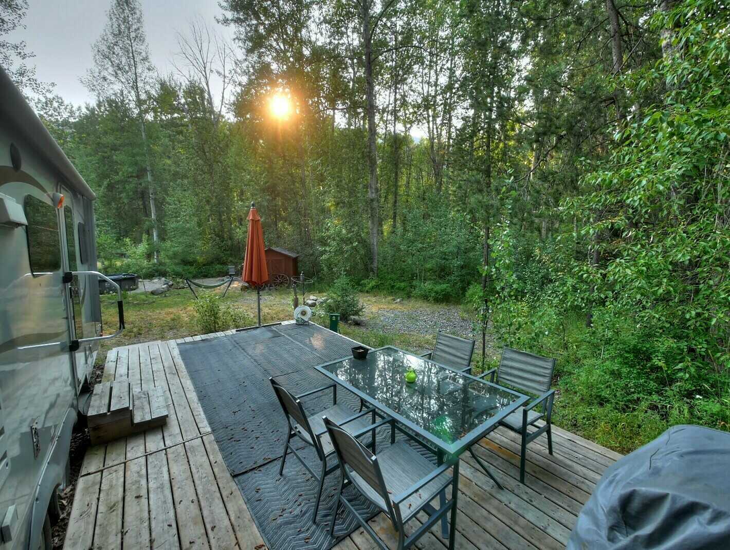 #2 Mountain Ridge Rd  - 3 Season MOYIE RIVER RANCH RESORT – Secluded, treed lot c/w RV! Steps to the Moyie River in a fabulous community! Ask about purchasing just the LOT at a Reduced Price!!! 4