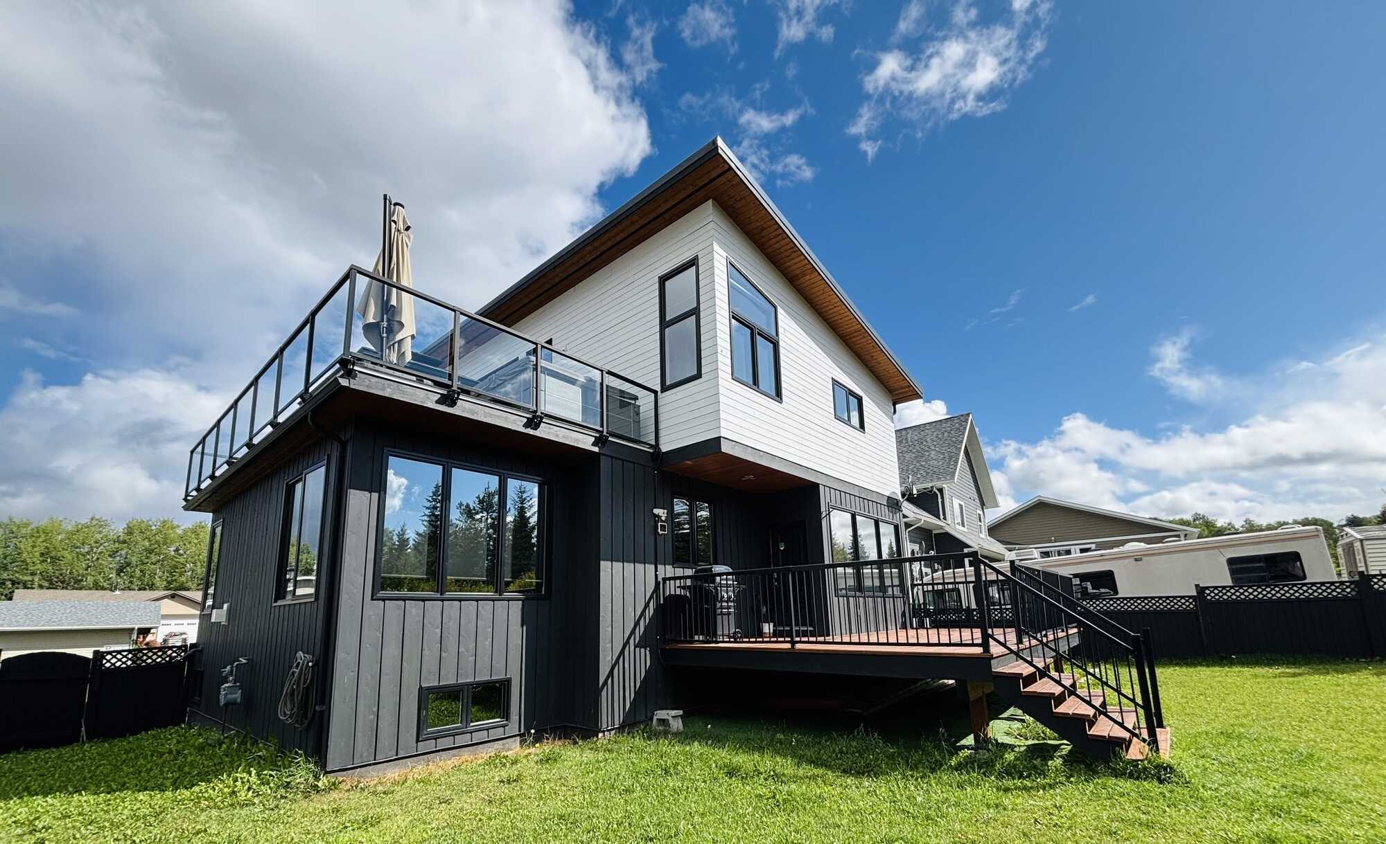 "Modern Lakefront in Smithers – West Coast Luxury with Mountain Views" 3