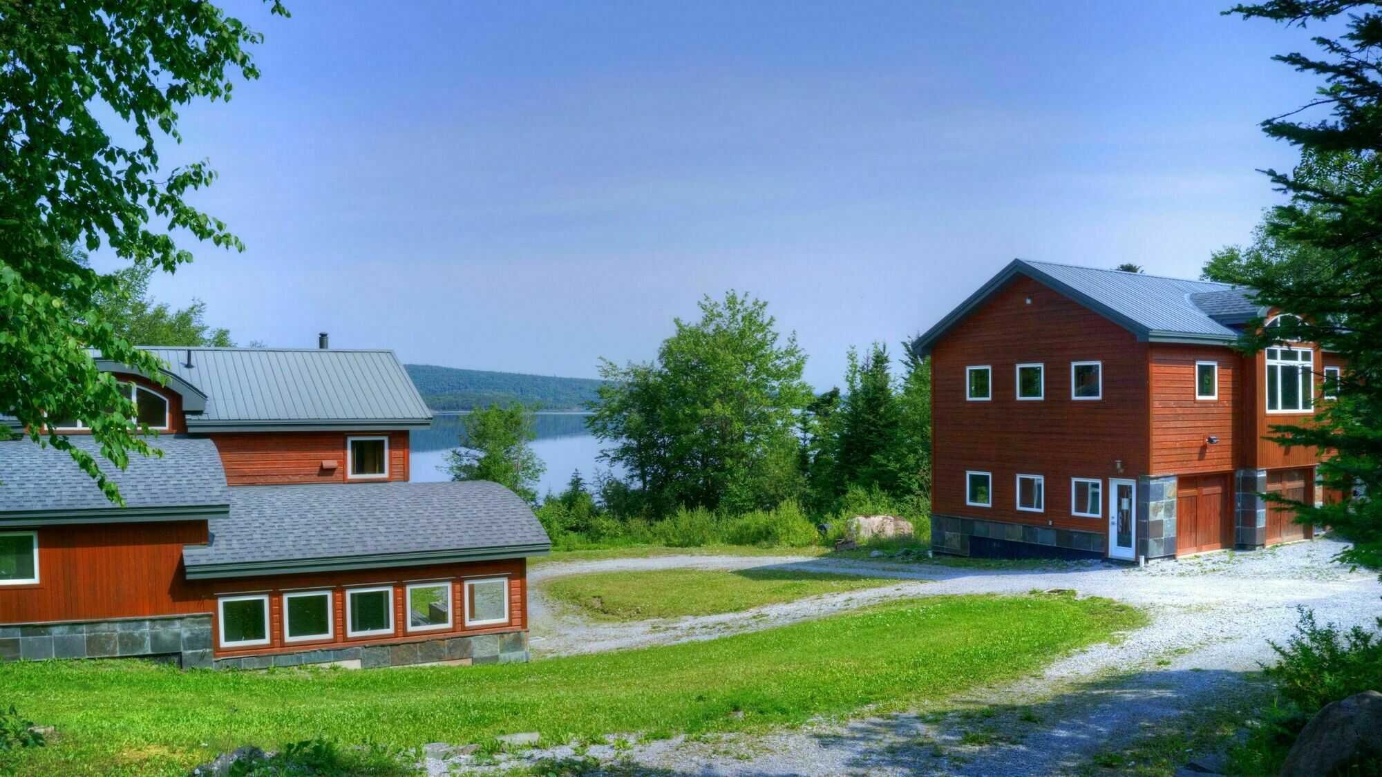 Located between Pasadena and Little Rapids in the heart of the Humber Valley. This unique one-acre lakefront property sits in a cove sheltered from the prevailing westerly wind and slopes gently down to a secluded beach. 4