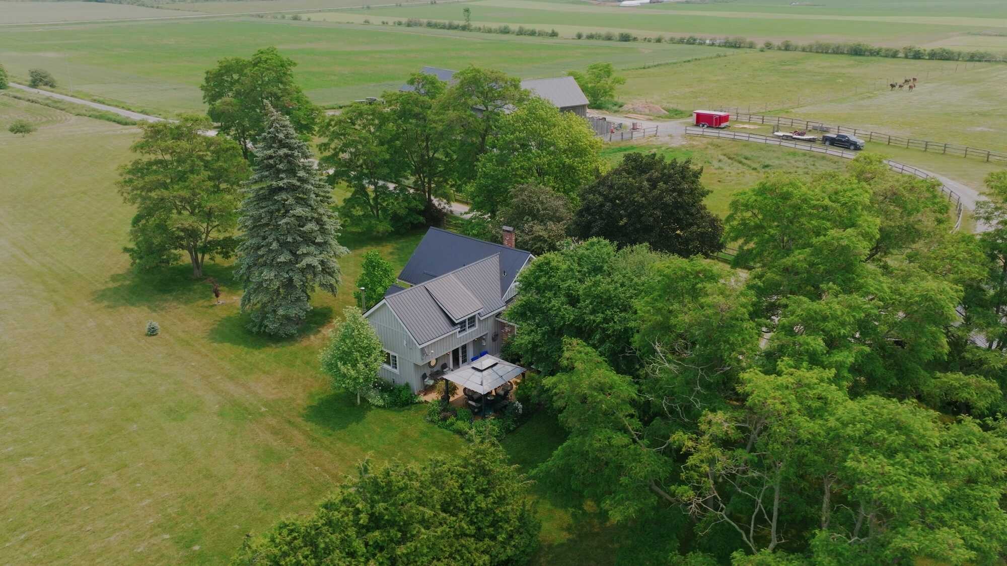 Amazing 70 acre property featuring an Equine Centre, fully renovated 5 bedroom Century Home, 3 car detached garage and a 15 stall horse barn! 3