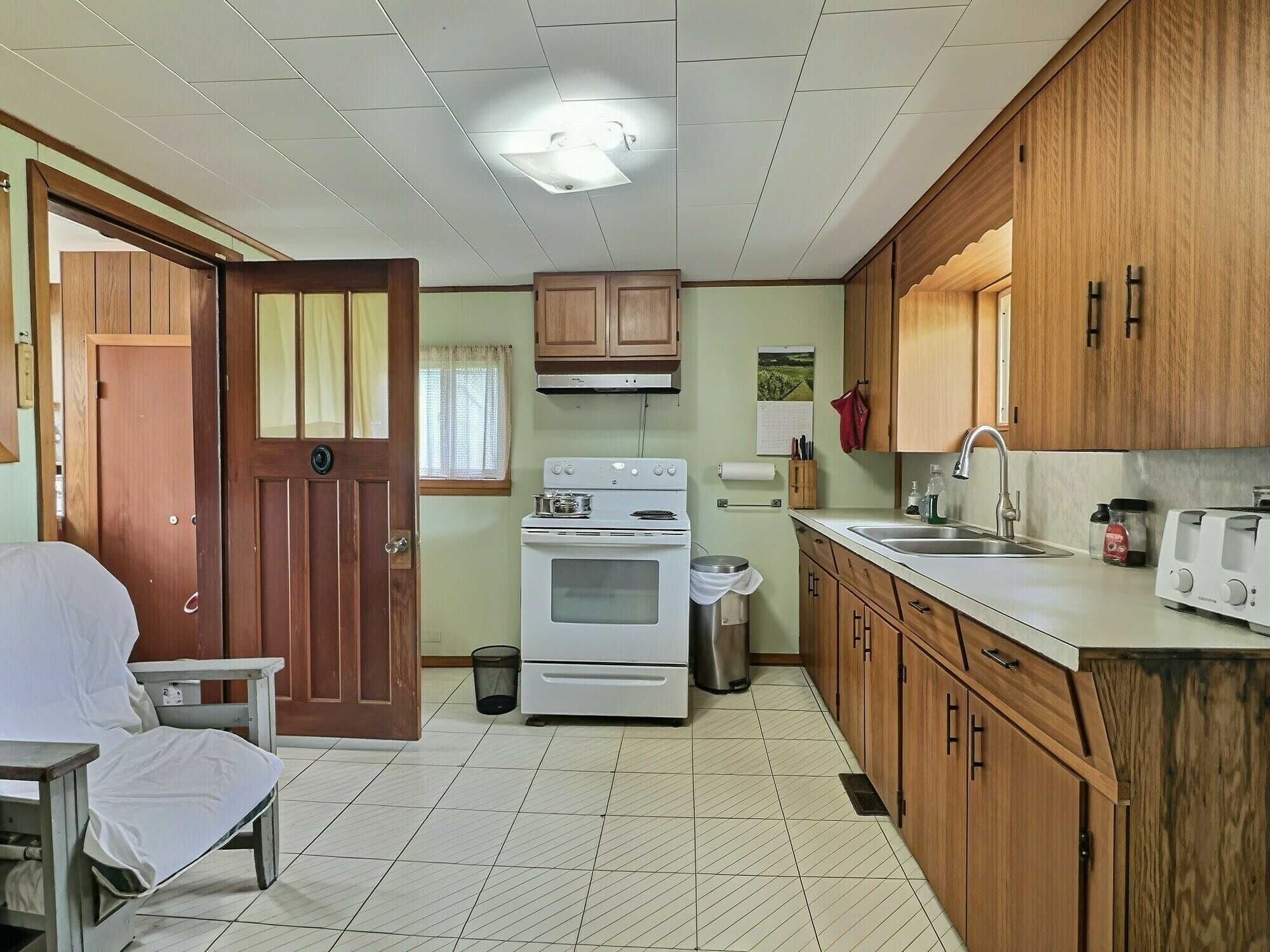 Bring your vision and restore the charm of this century home set on 11 beautiful acres of peaceful countryside! 2