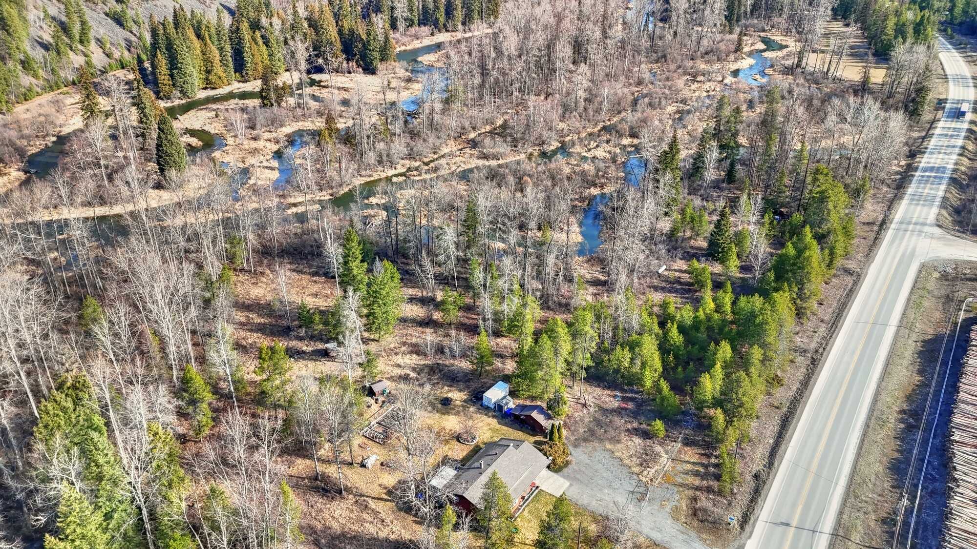 Large RIVER FRONT Acreage in Yahk!!  Nearly 67 Acres! Easy Access w/ a Wonderful 4Bed 2Bath Family home!  Great horse farm or hobby farm! 3