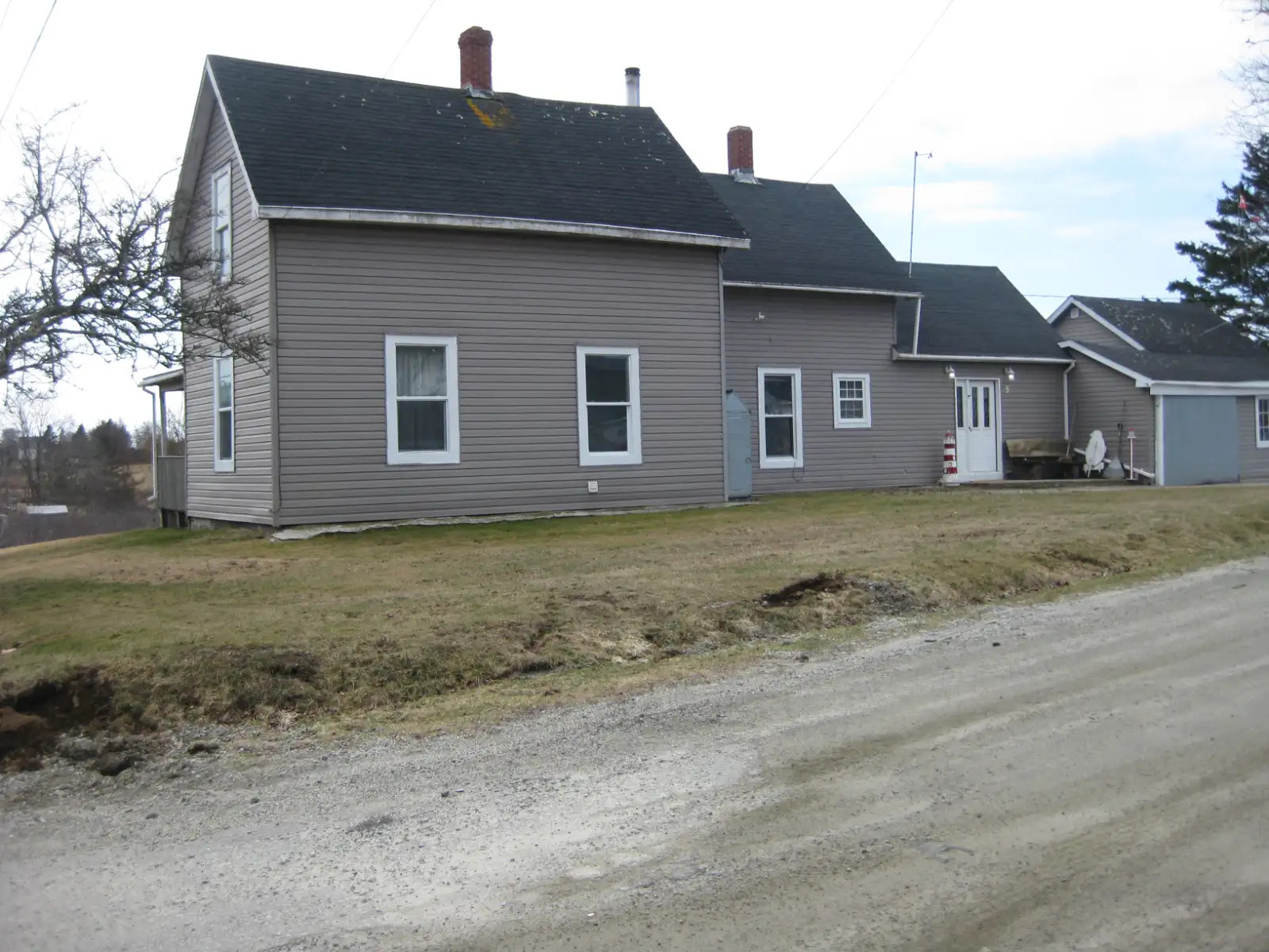Historic Homestead on 4.5 Acres with Stream Frontage & Endless Potential 5