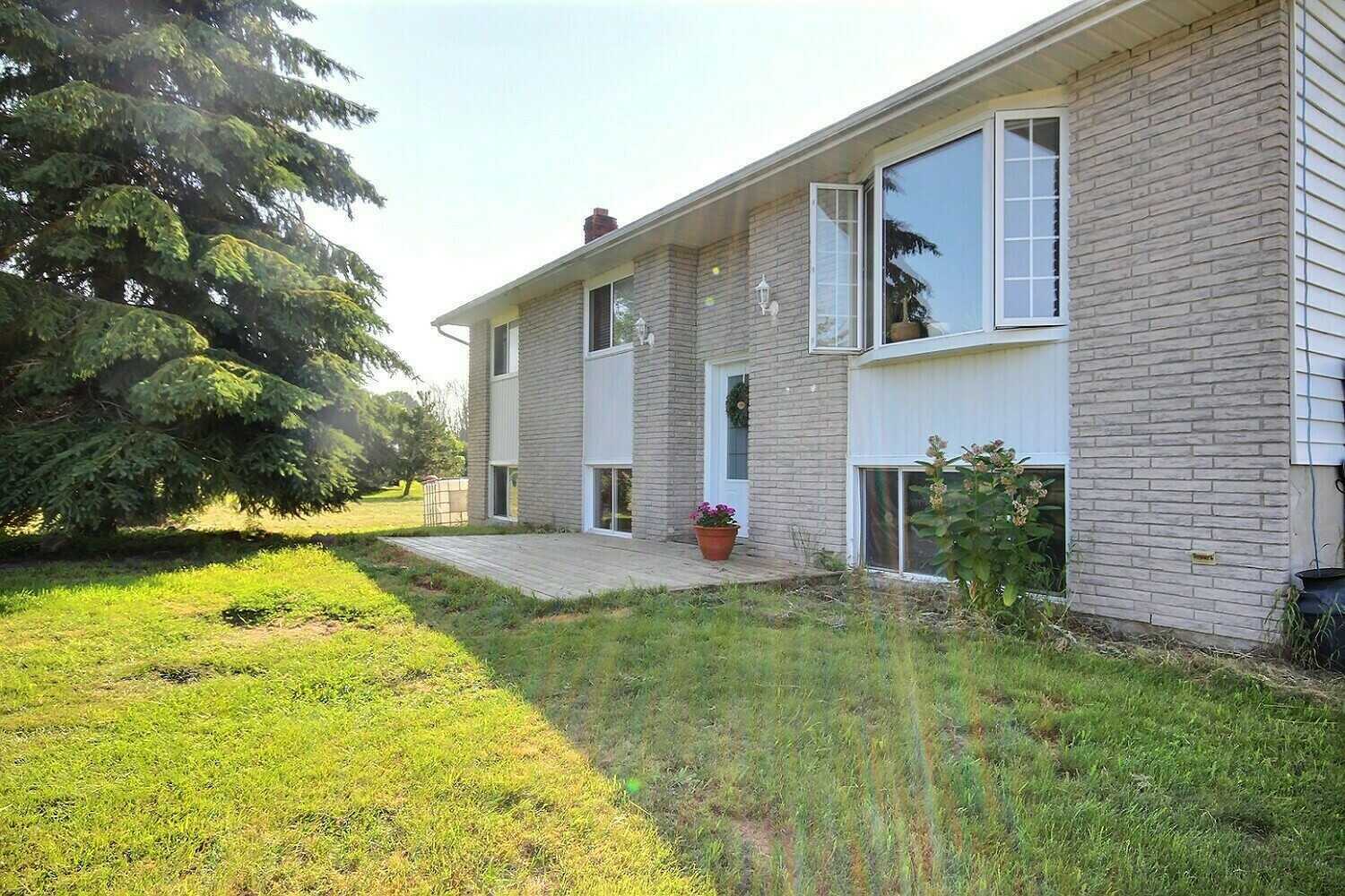 Raised 3-bedroom bungalow on 4+ acres in rural Prince Edward County with lots of potential to add your own personal touches. 2