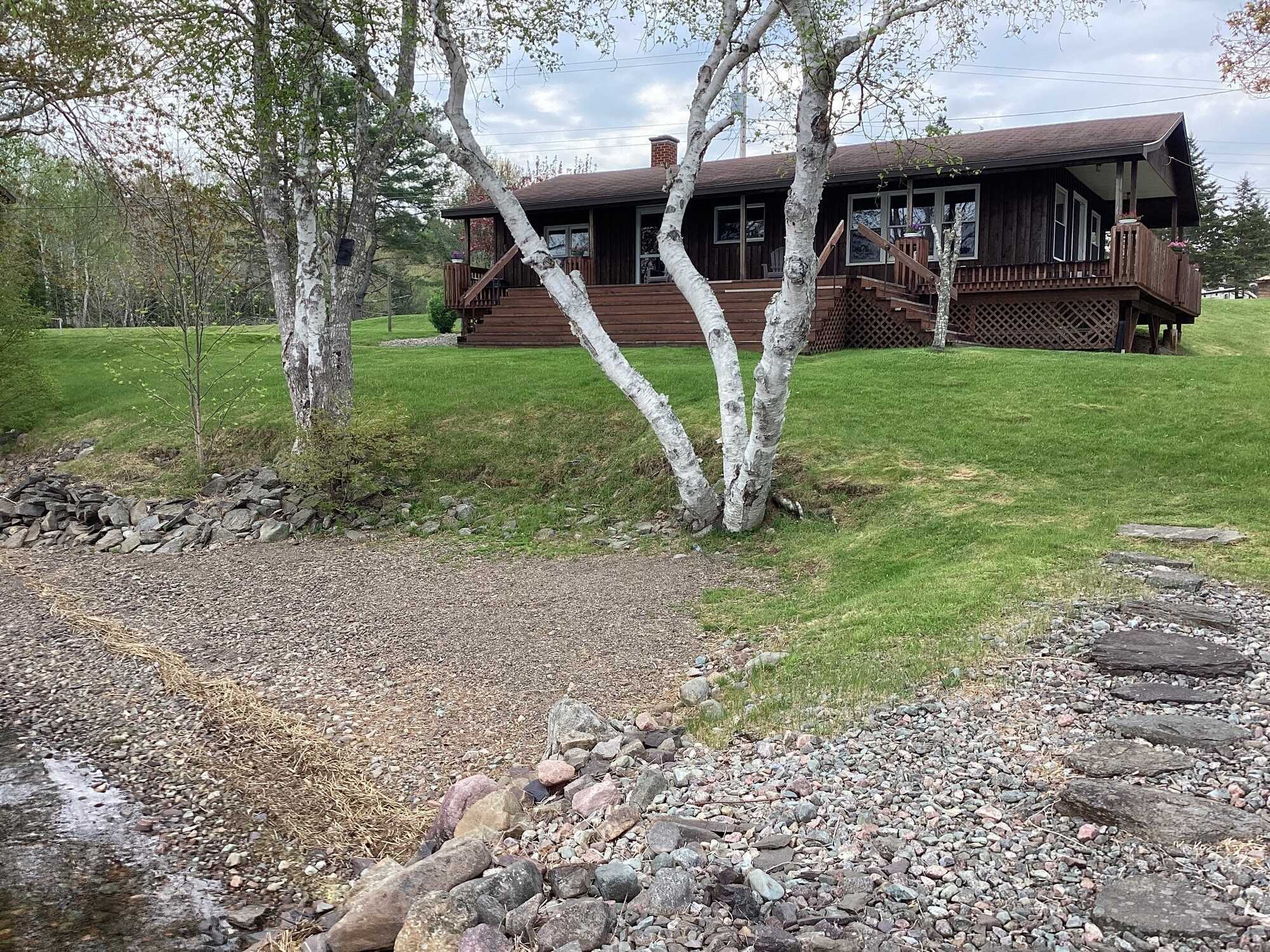 A must see waterfront property with efficient heating & lots of space for guests! 2