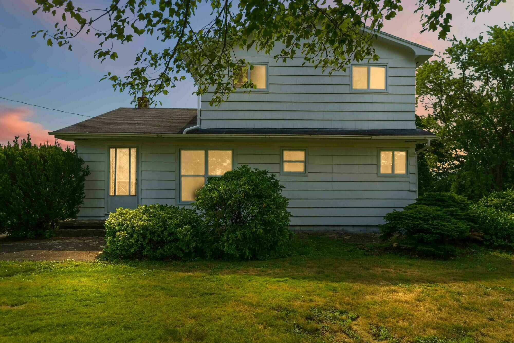 Country Living with Almost 4 Acres, Garage & Large Barn! 2