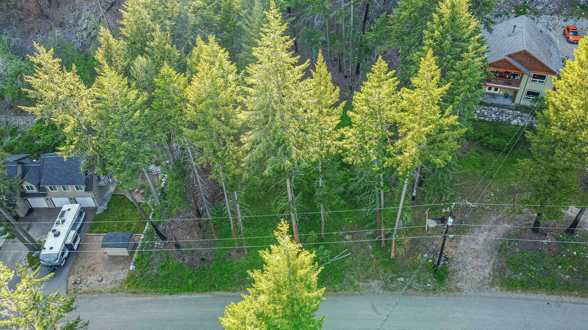 Enjoy the privacy and serenity of this fantastic .61 Acre lot with water and power onsite! Located at the top of Killiney Beach subdivision. This is a must see! 3