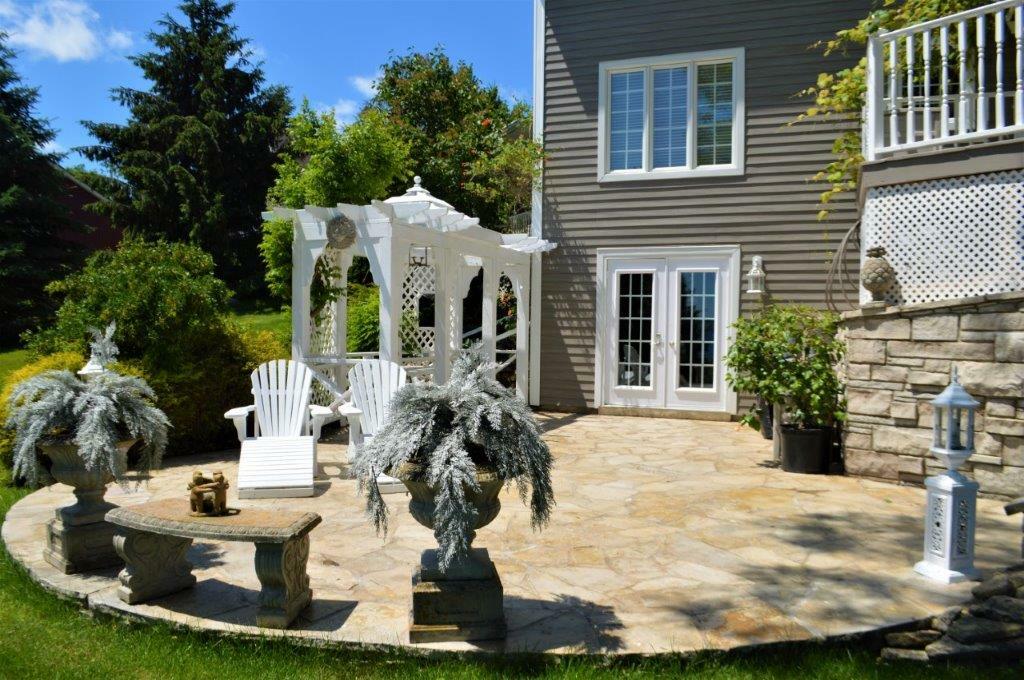 VTB MORTGAGE AT BELOW MARKET RATES on Georgian Bay waterfront property with Pier and Concrete Dock located in prestigious Sutacriti Park.   Manicured landscaping with Pond.  Nearly 3400 sq ft of luxury living space with separate entry In-law Suite. 5