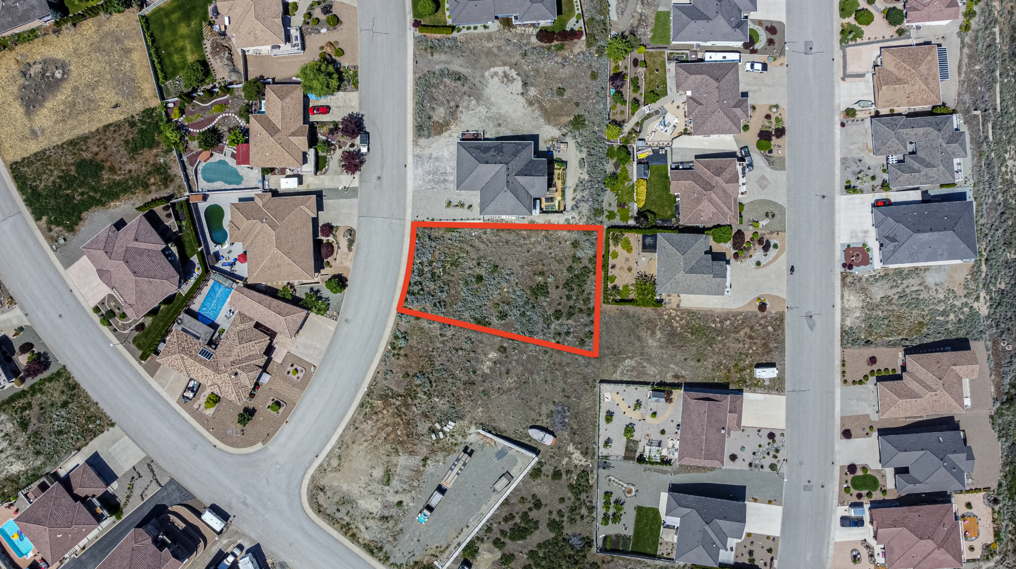 Build your dream home on this .284 acre lot overlooking the Osoyoos Golf Course with breathtaking VIEWS of the lake, mountains & downtown Osoyoos! 2