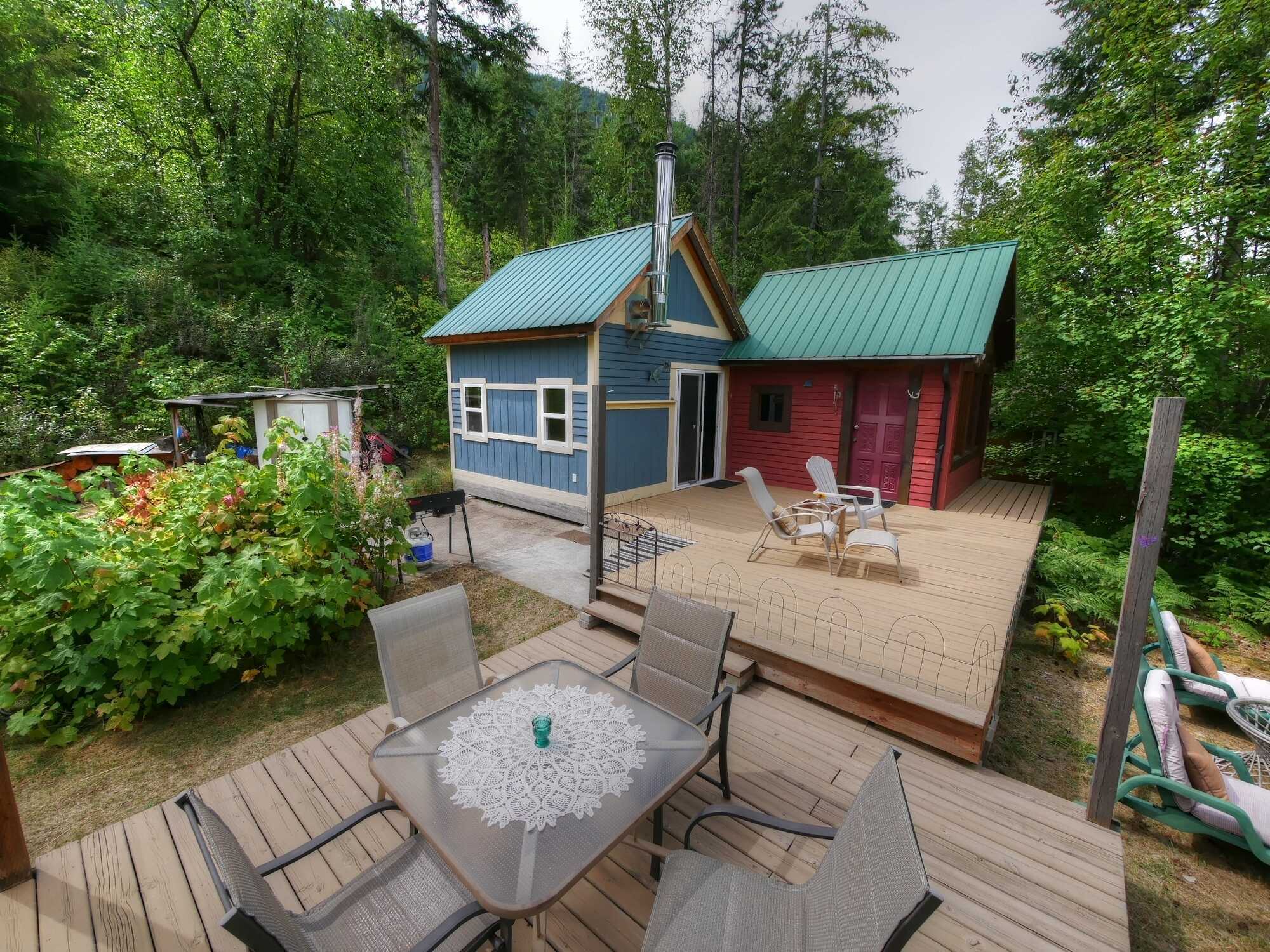 WATERFRONT off-grid cabin on 6.46 acres with an incredible 246 feet of beach! Right on Arrow Lake, 33km from Castlegar across from Deer Park. Peaceful & private property of your dreams - you won't find another anything like it in this price range! 2