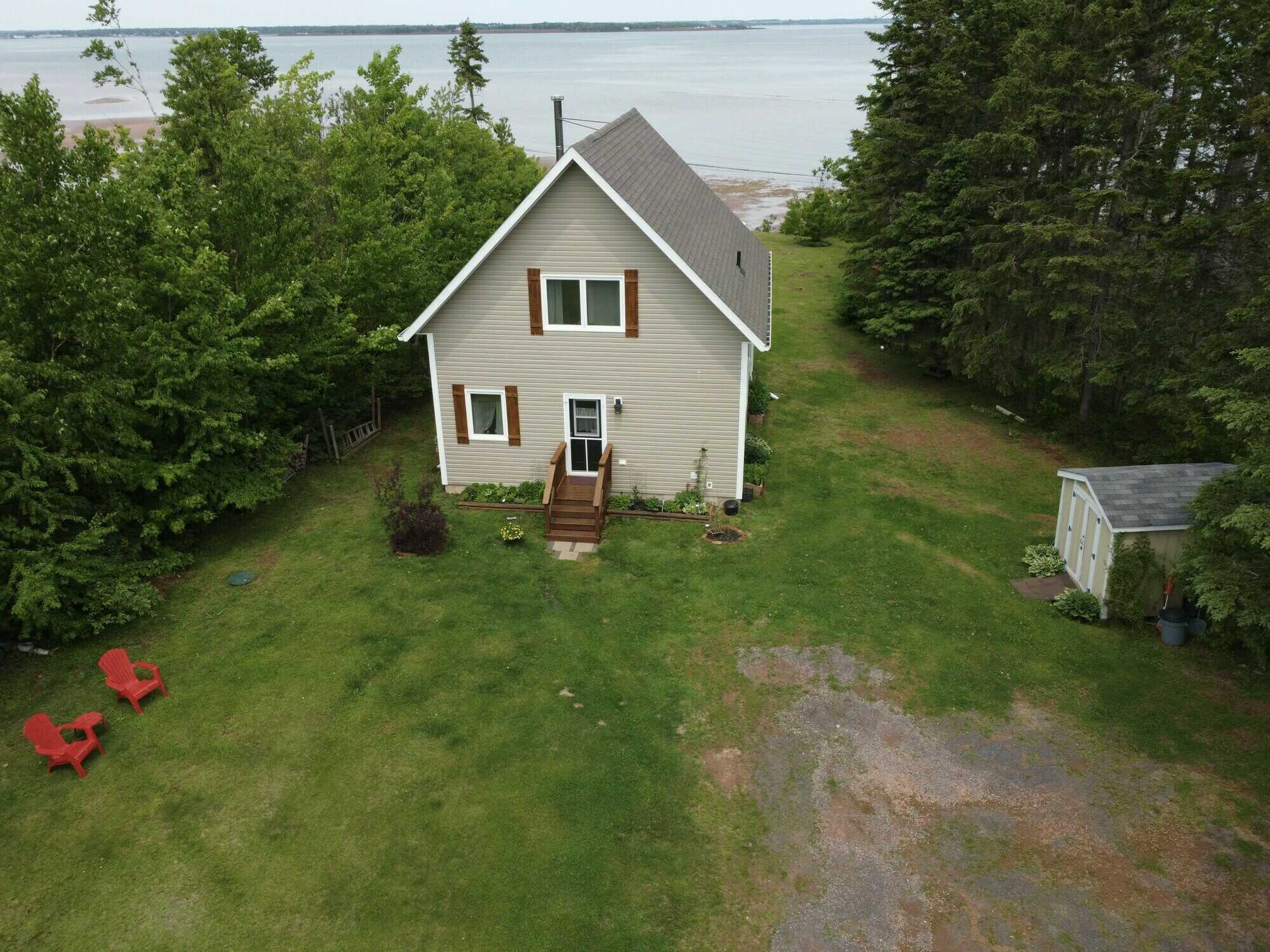 Experience the ultimate in coastal living with this exquisite executive waterfront property on the picturesque Panmure Island! 5