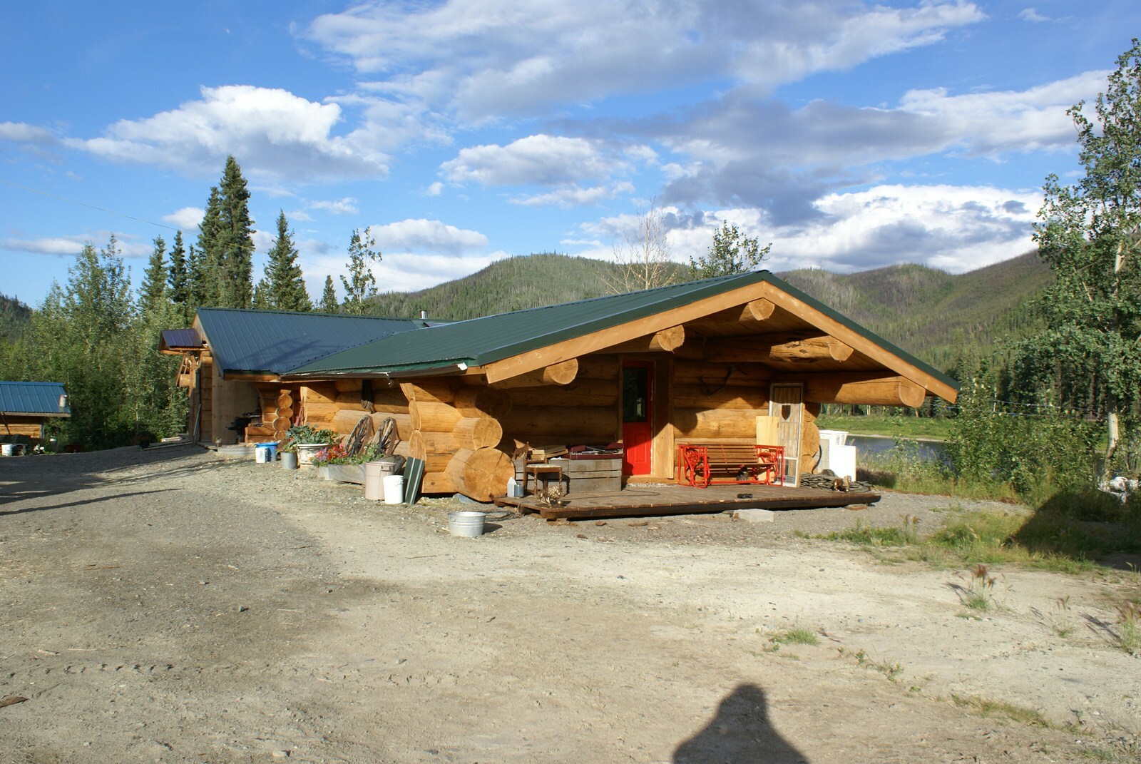 Log home, lodge/camp, guest cabins, & more situated on one mile of river frontage. 3