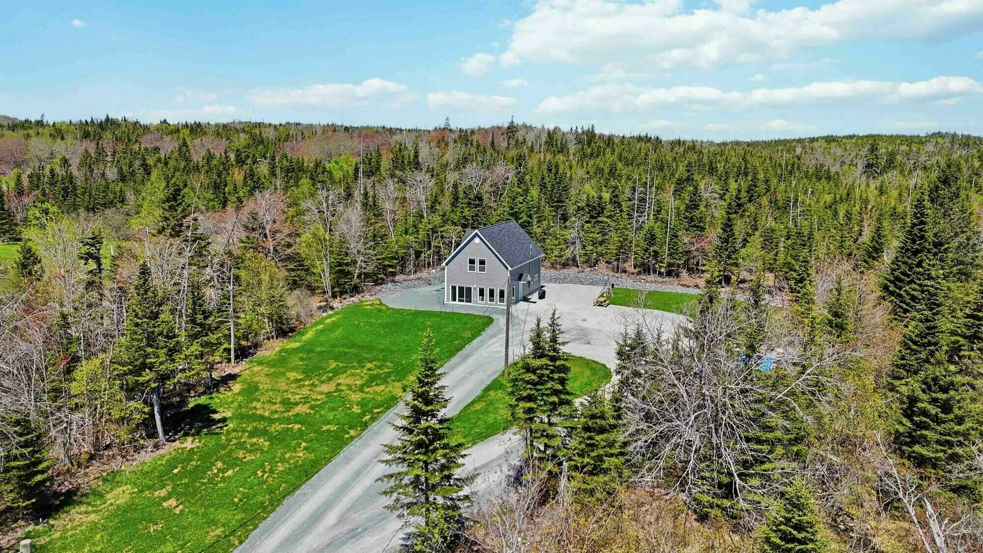 Modern Coastal Living on 2.3 Private Acres | Ocean Views | 4 Bedrooms | One Year Old Home with Approved Second Septic and Future Development Potential 4