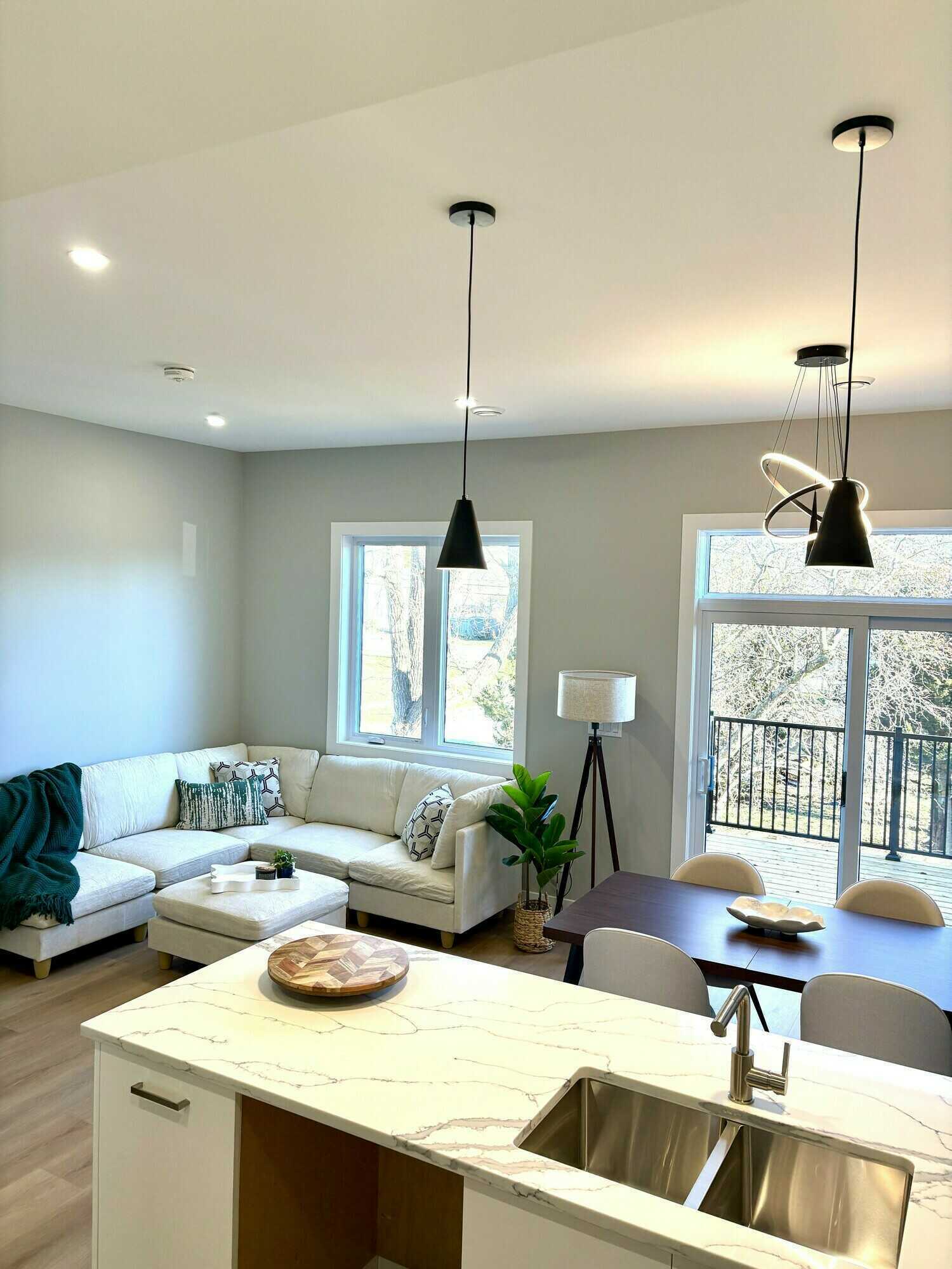 TWO HOMES UNDER ONE ROOF — LIVE UPSTAIRS, RENT DOWNSTAIRS! 4