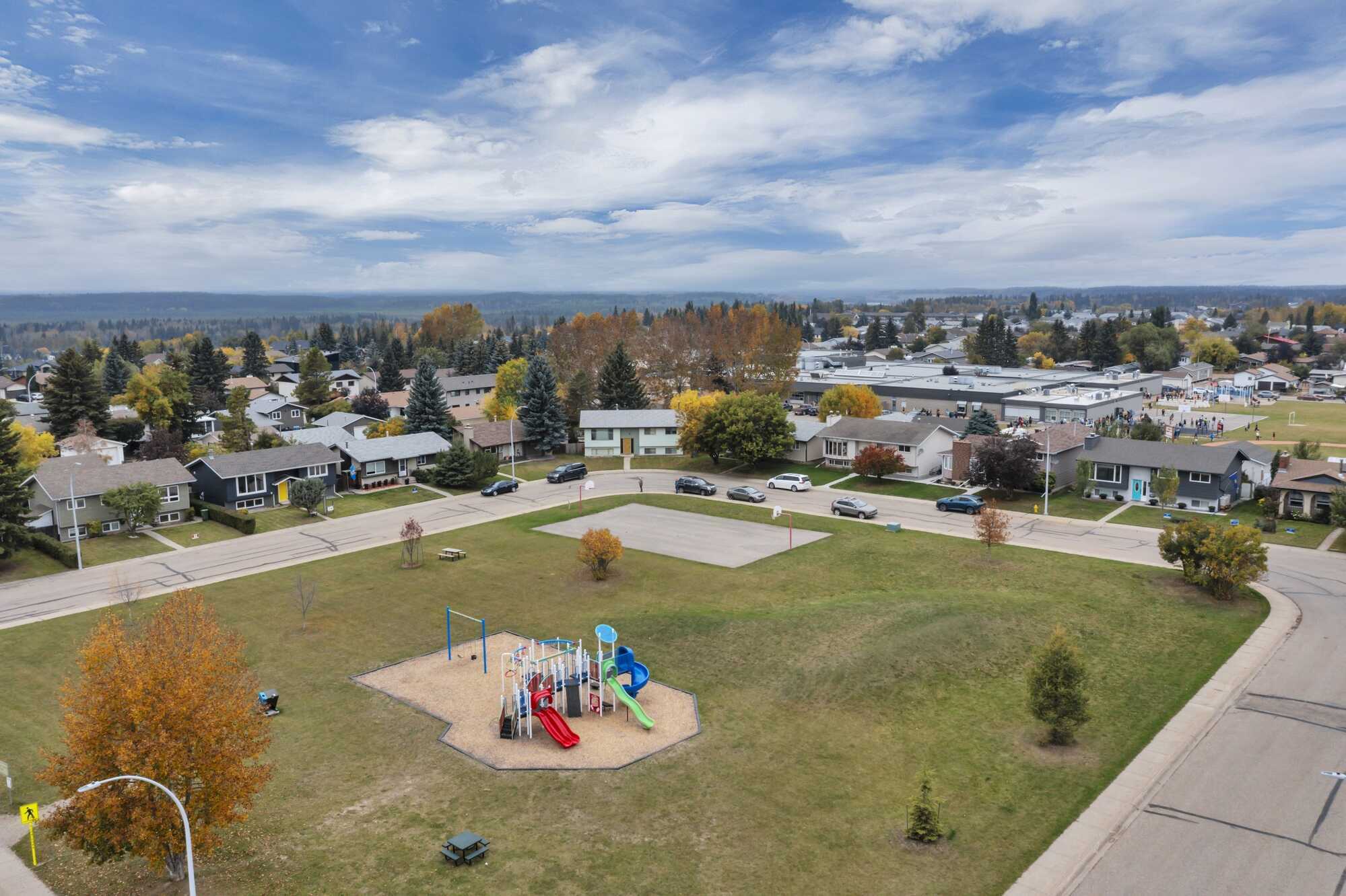 Great Investment Opportunity ~ Pie Shaped Lot ~ Bi-Level ~ 2 Independent Living Spaces ~ Double Detached Heated Garage ~ Across From Green Space 4