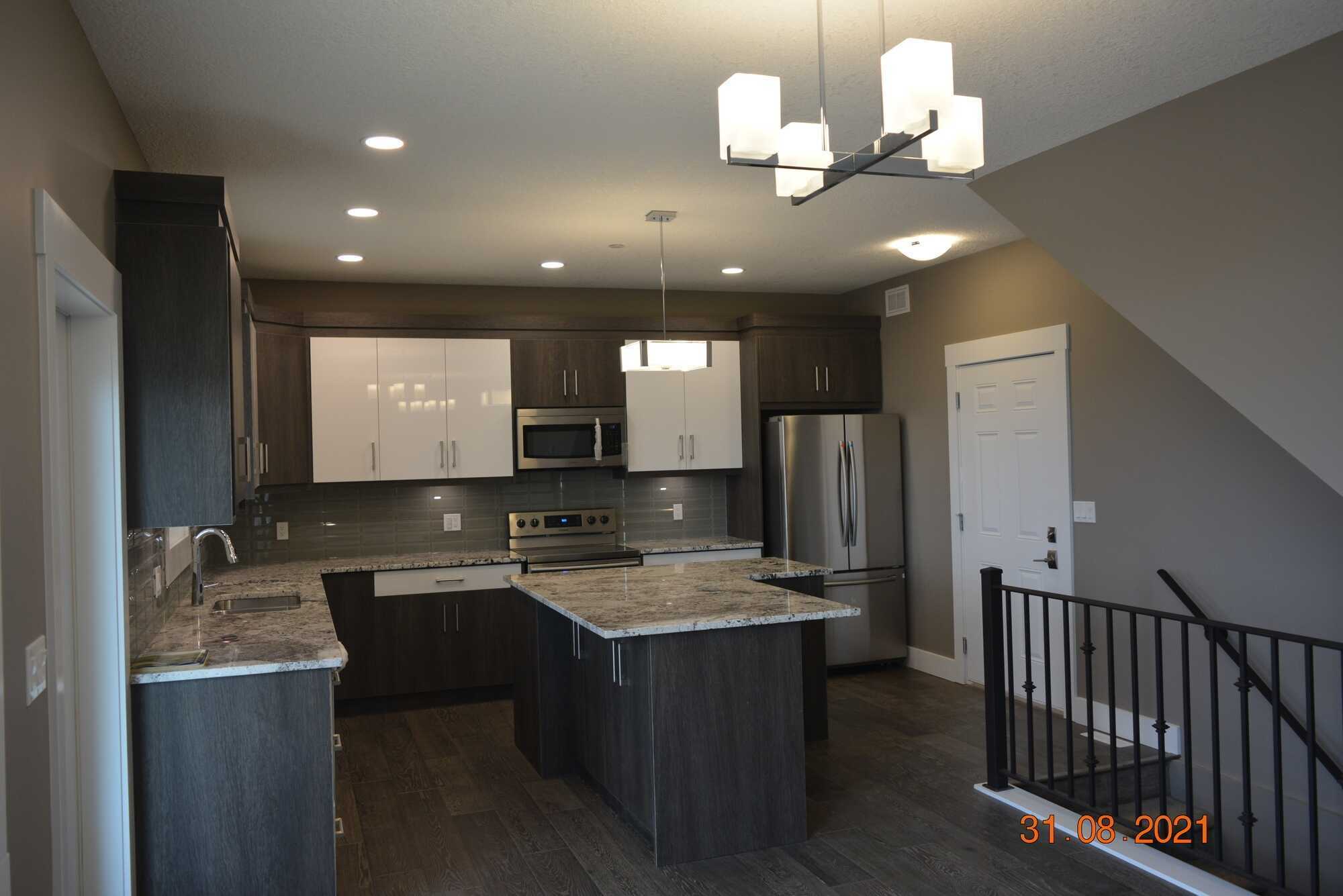 This bright new 1,820 sq.ft. 2-storey home sits across from the All-Saints school playground and is at a walking distance from the hospital, medical and dental clinics, restaurants and shopping. 5